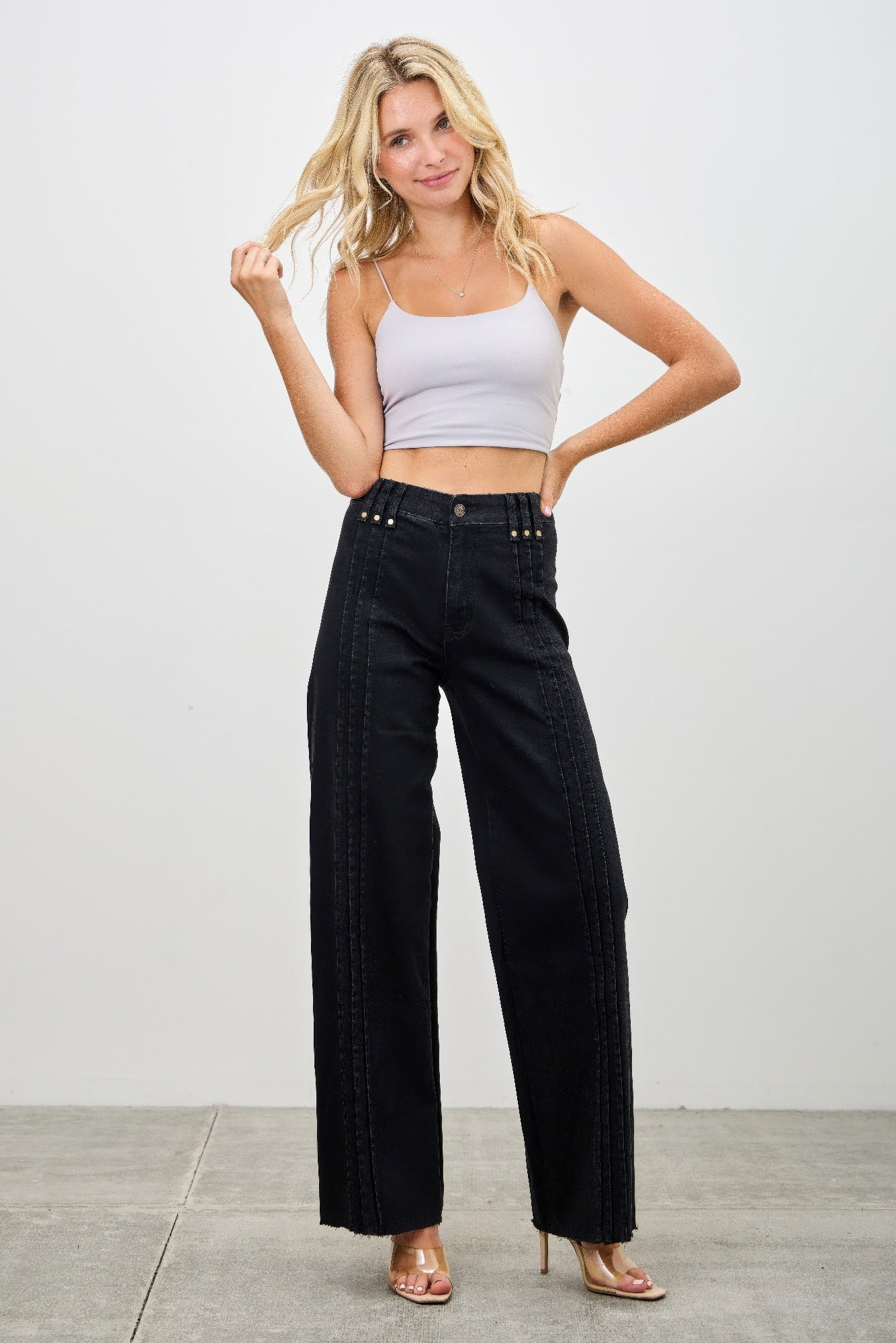 High rise straight jeans with front line details by Toshe Women's Fashions, showing the fit and stylish design.