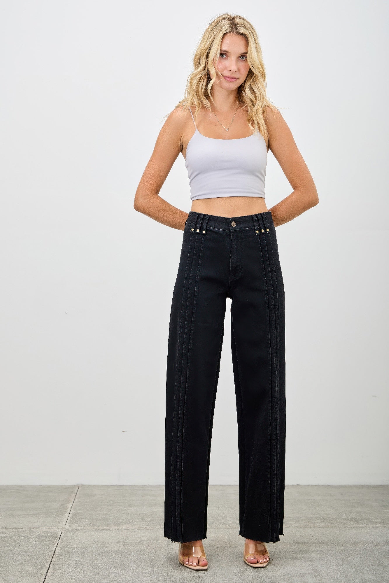 Toshe Women's Fashions high rise straight jeans with front line details, shown on a model against a neutral background.