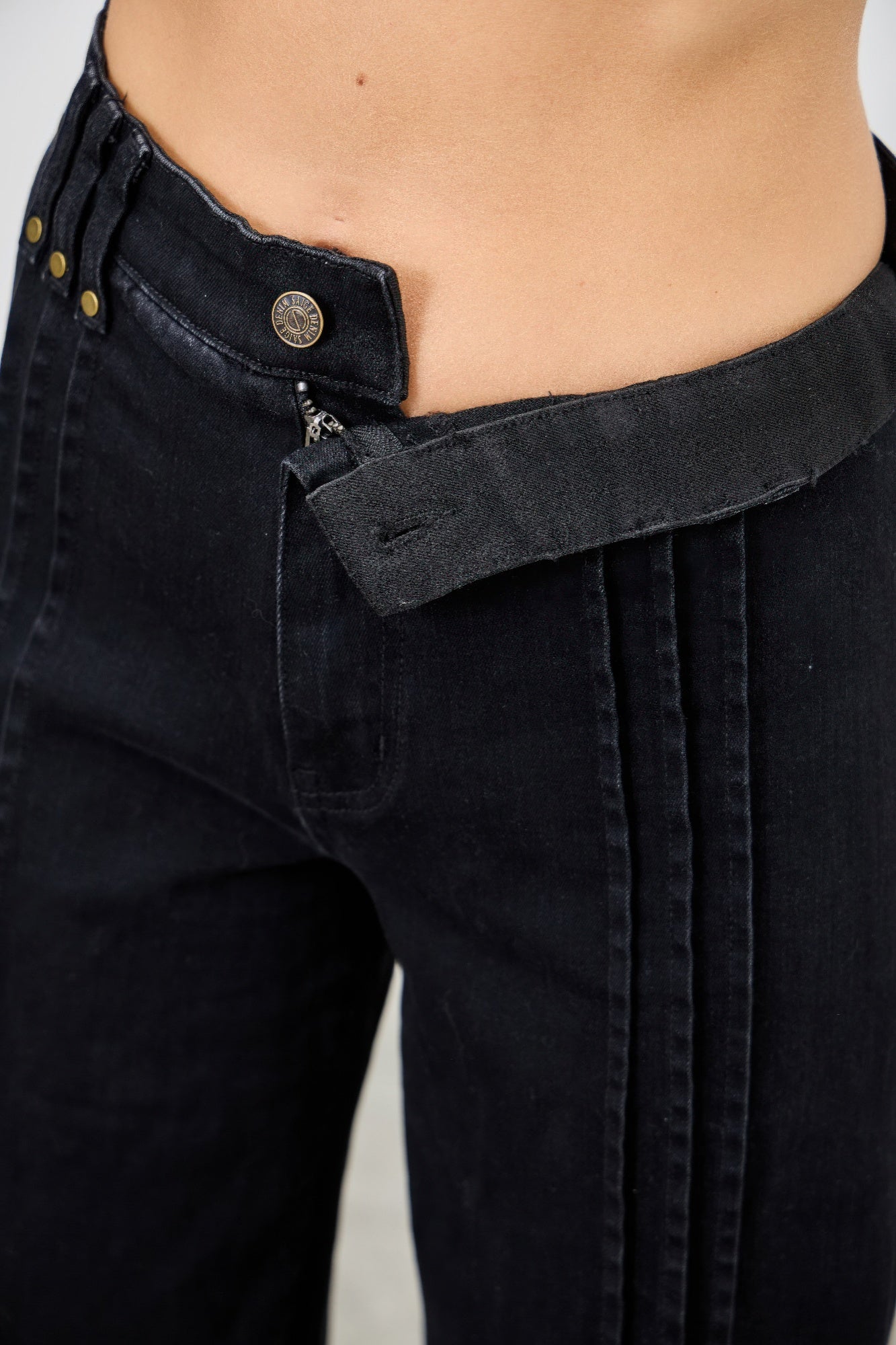 Toshe Women's Fashions high rise straight jeans with front line detailing, shown on a model with a casual outfit.