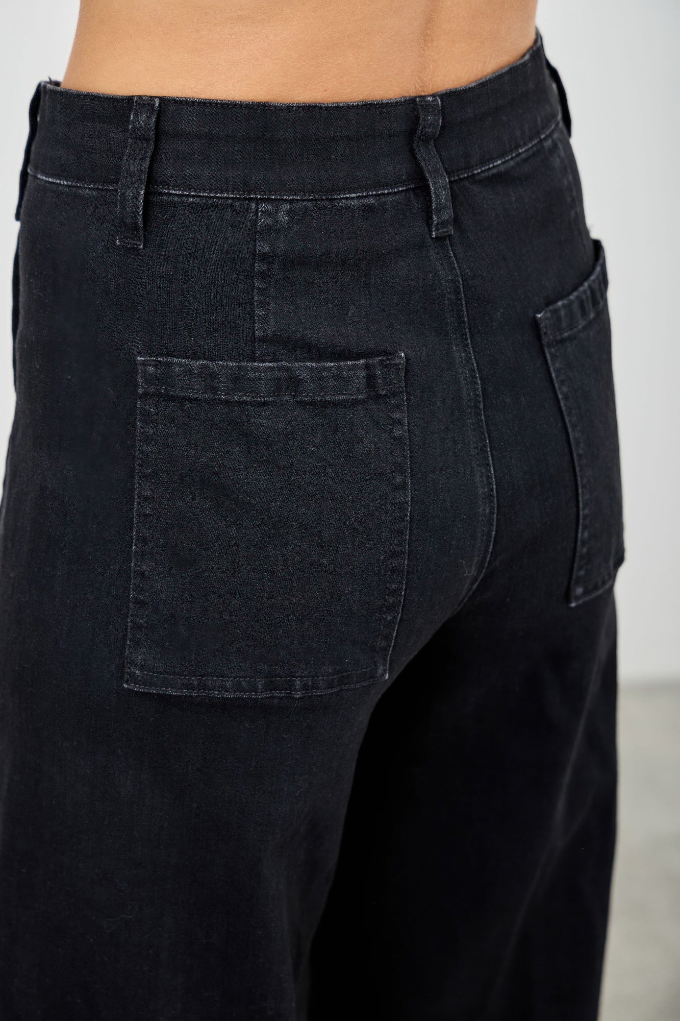 Toshe Women's Fashions high rise straight jeans with front line detailing, fitted on a model, showing the fit and style of the pants.