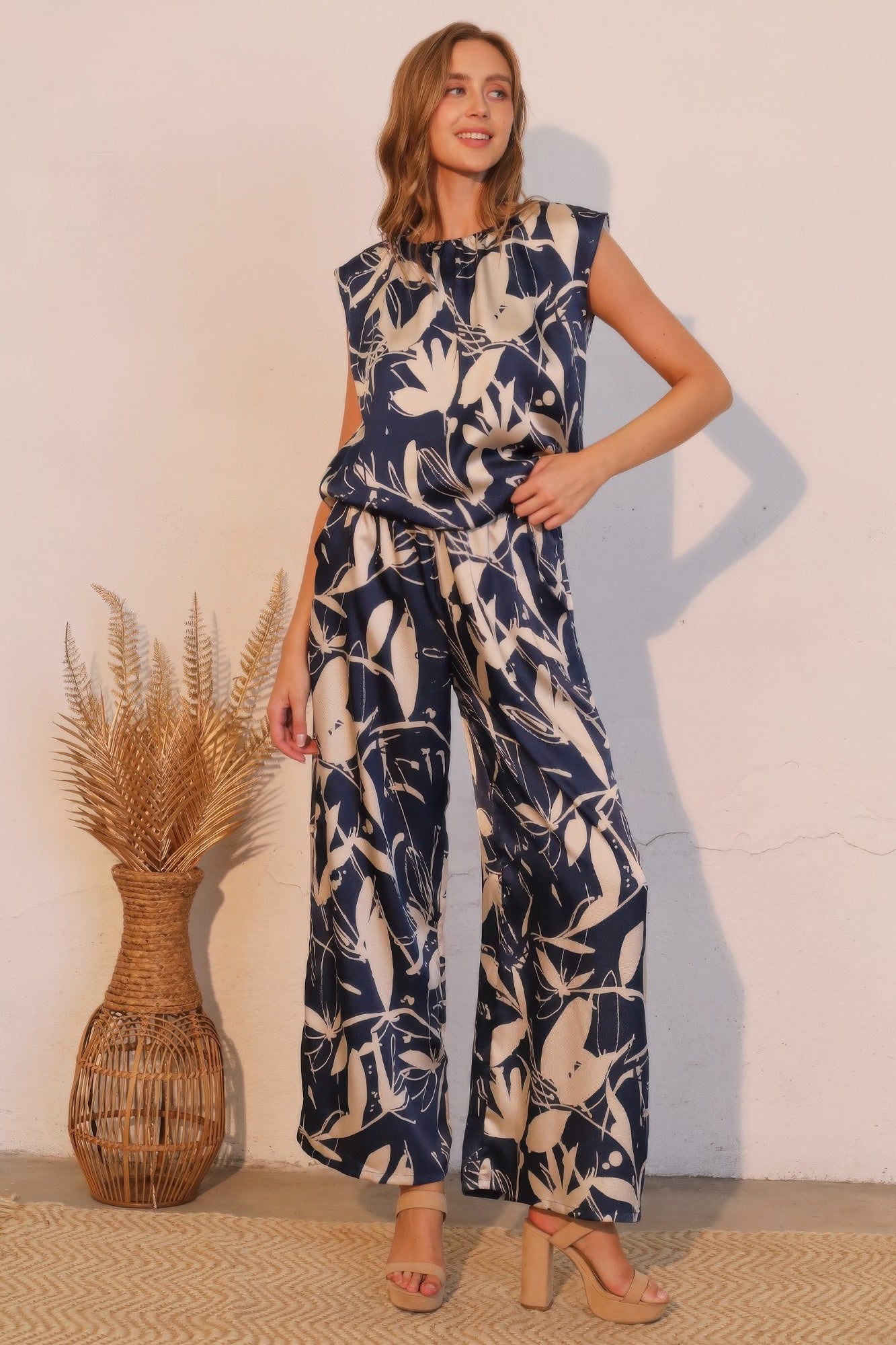 Dreaming Lily satin pocket pants by Toshe Women's Fashions featuring a sleek satin fabric and functional side pockets.