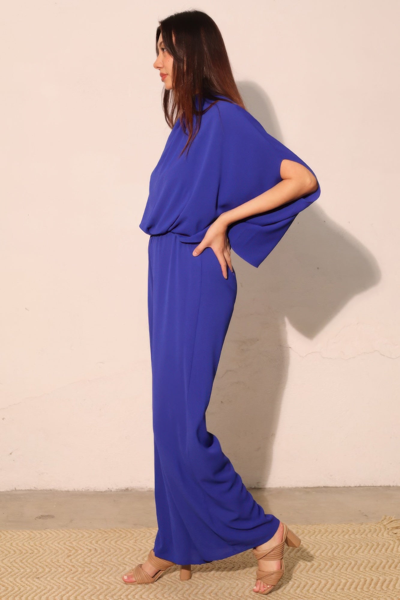 Textured solid mock neck caftan jumpsuit from Toshe Women's Fashions, featuring a relaxed fit and wide-leg design.