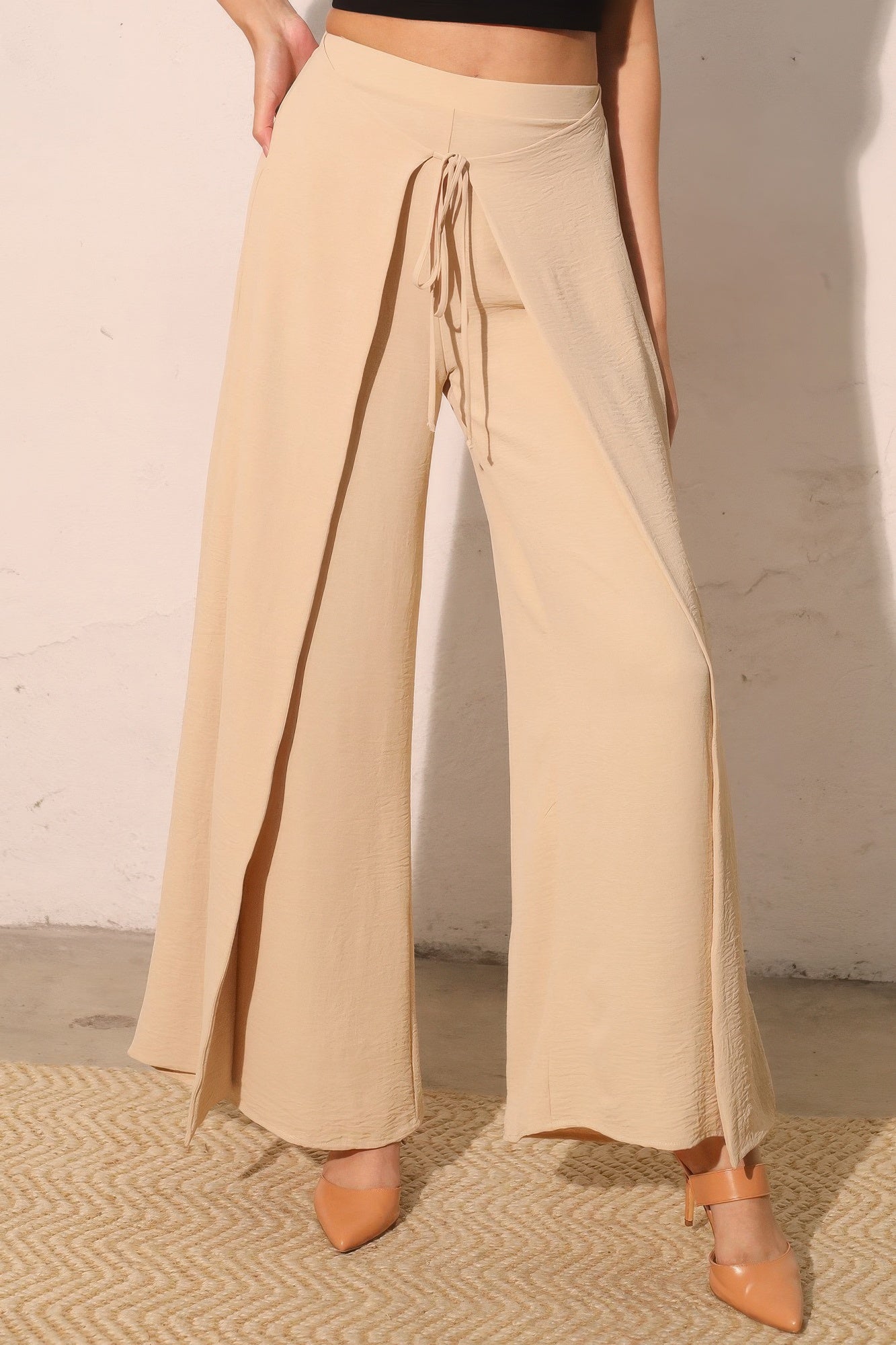 Matte crepe overlap pants in neutral color, stylish women's fashion by Toshe Women's Fashions, shown on a model.