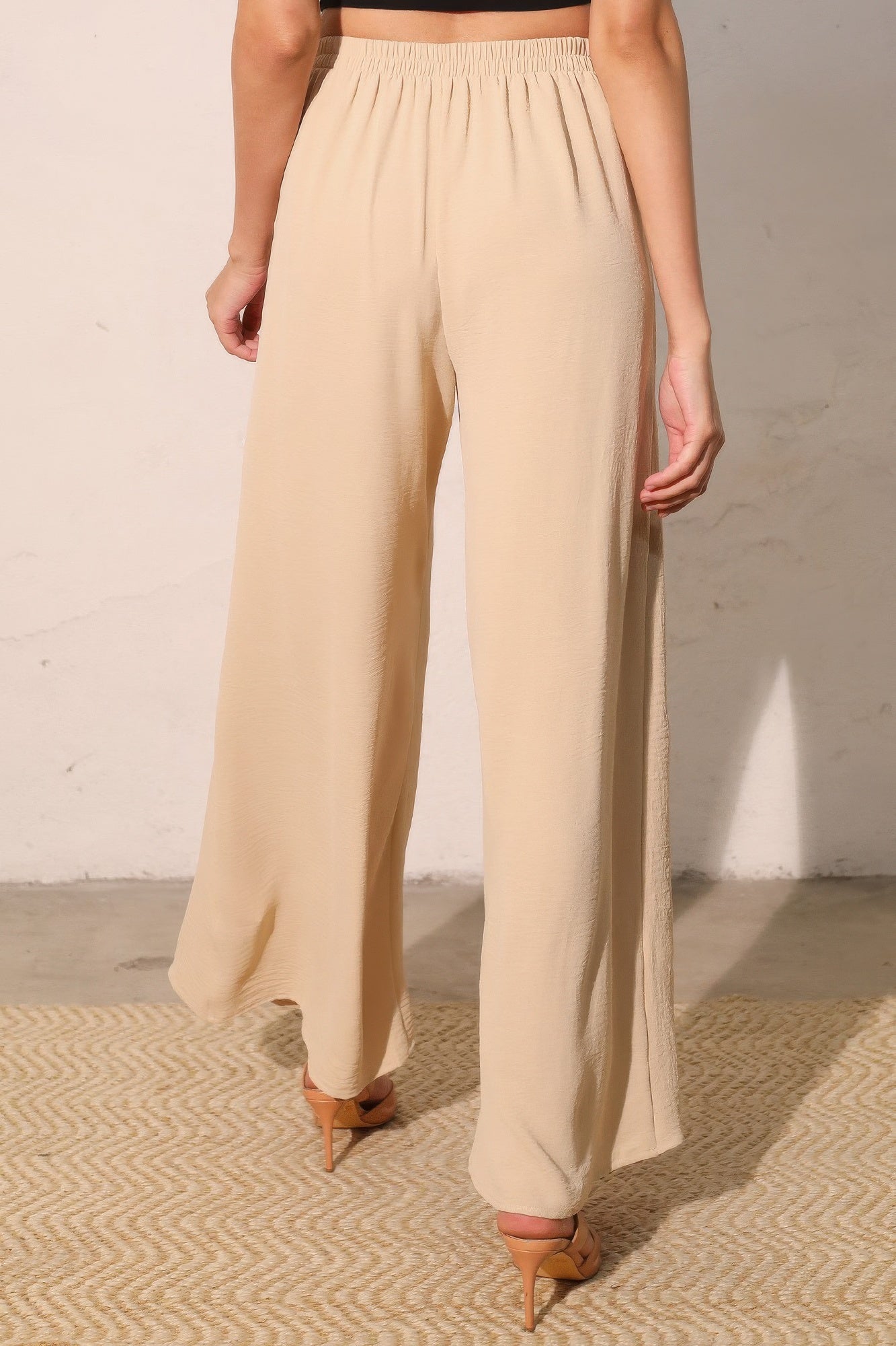 Matte crepe overlap pants in neutral tone, stylish women's fashion by Toshe Women's Fashions, displayed on a white background.
