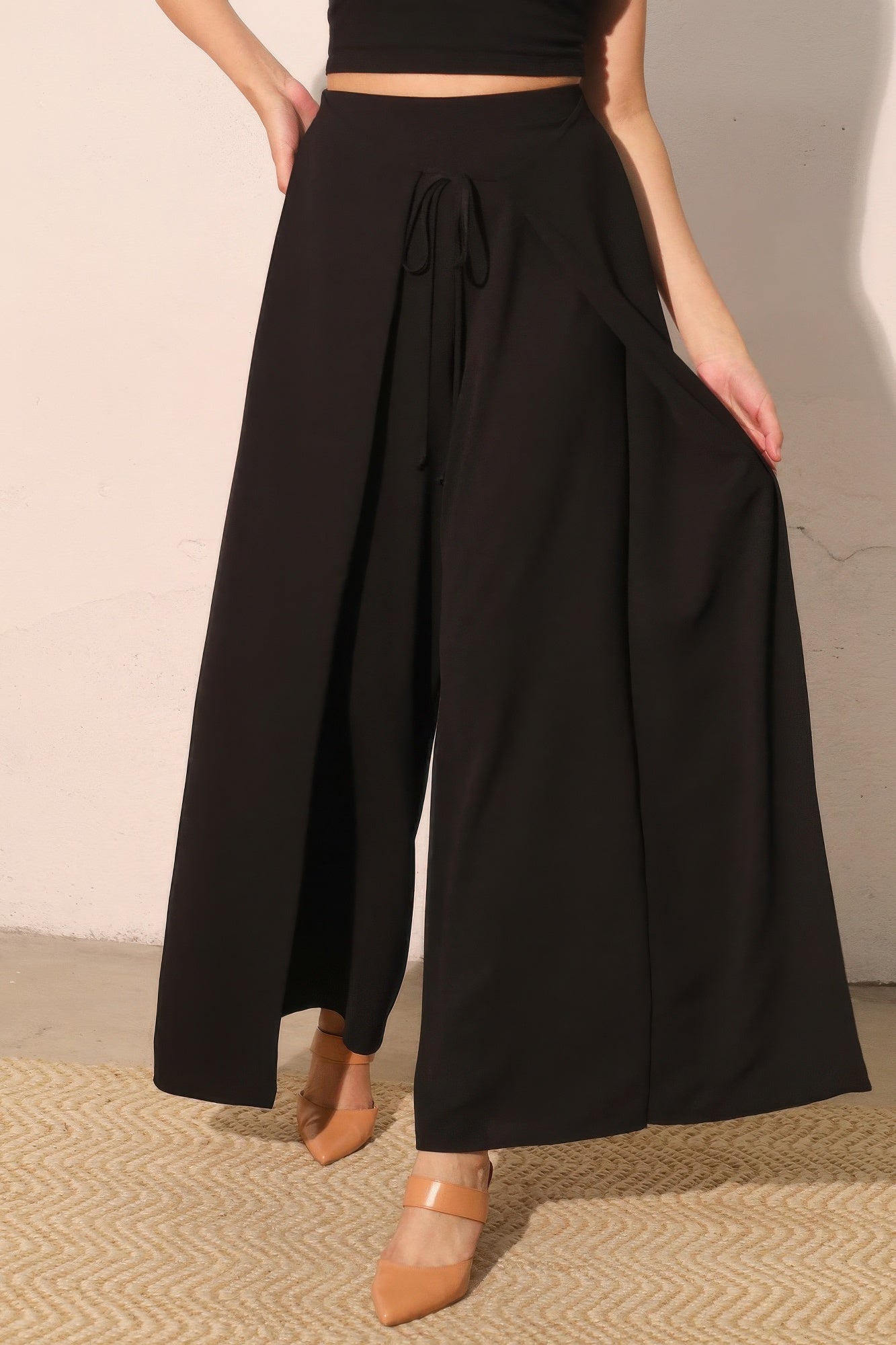Matte crepe overlap pants in neutral color from Toshe Women's Fashions, featuring a high waist and wide-leg design.
