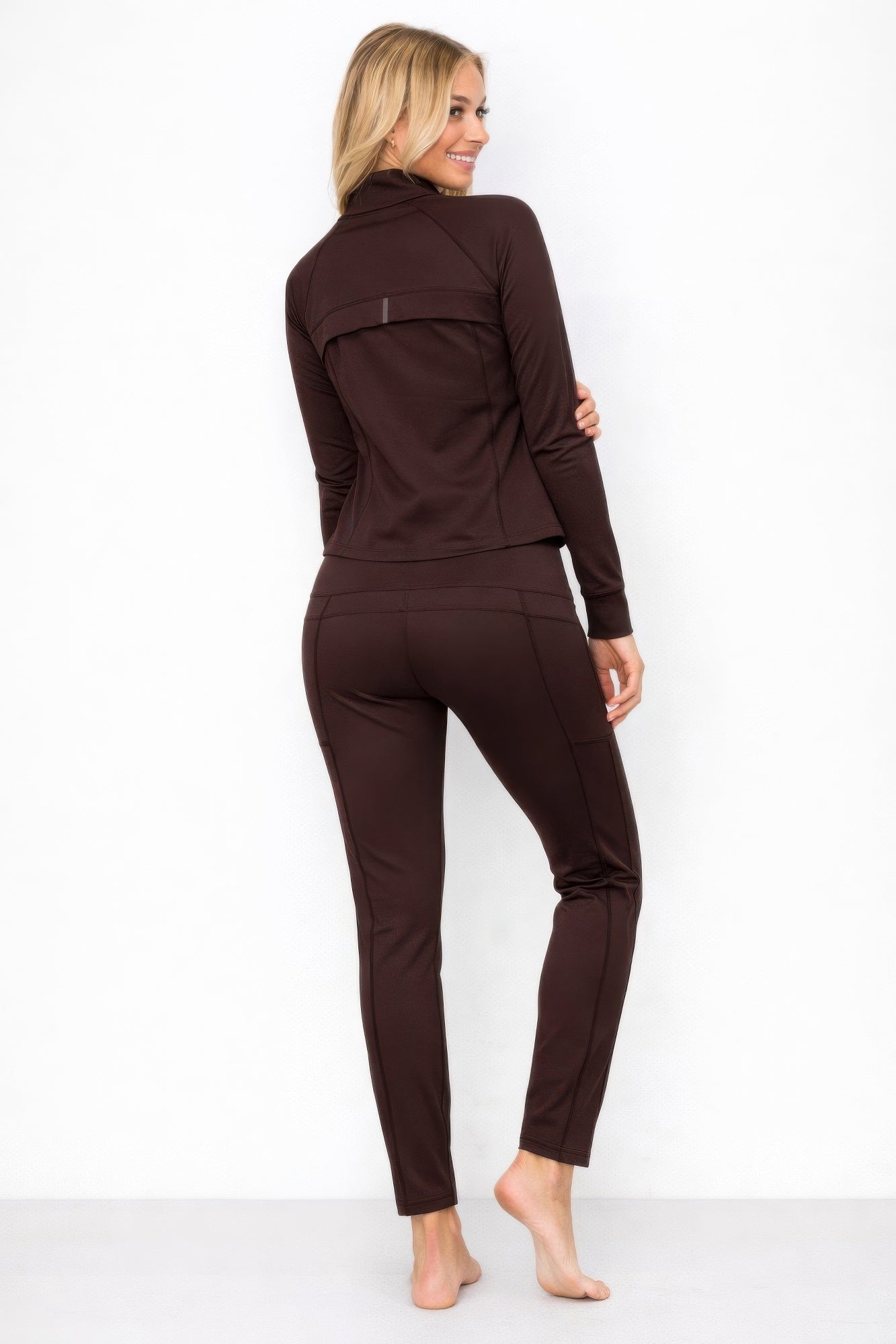 Brown high neck zip-up jacket and pant set by Toshe Women's Fashions, featuring a stylish, coordinated casual wear look.