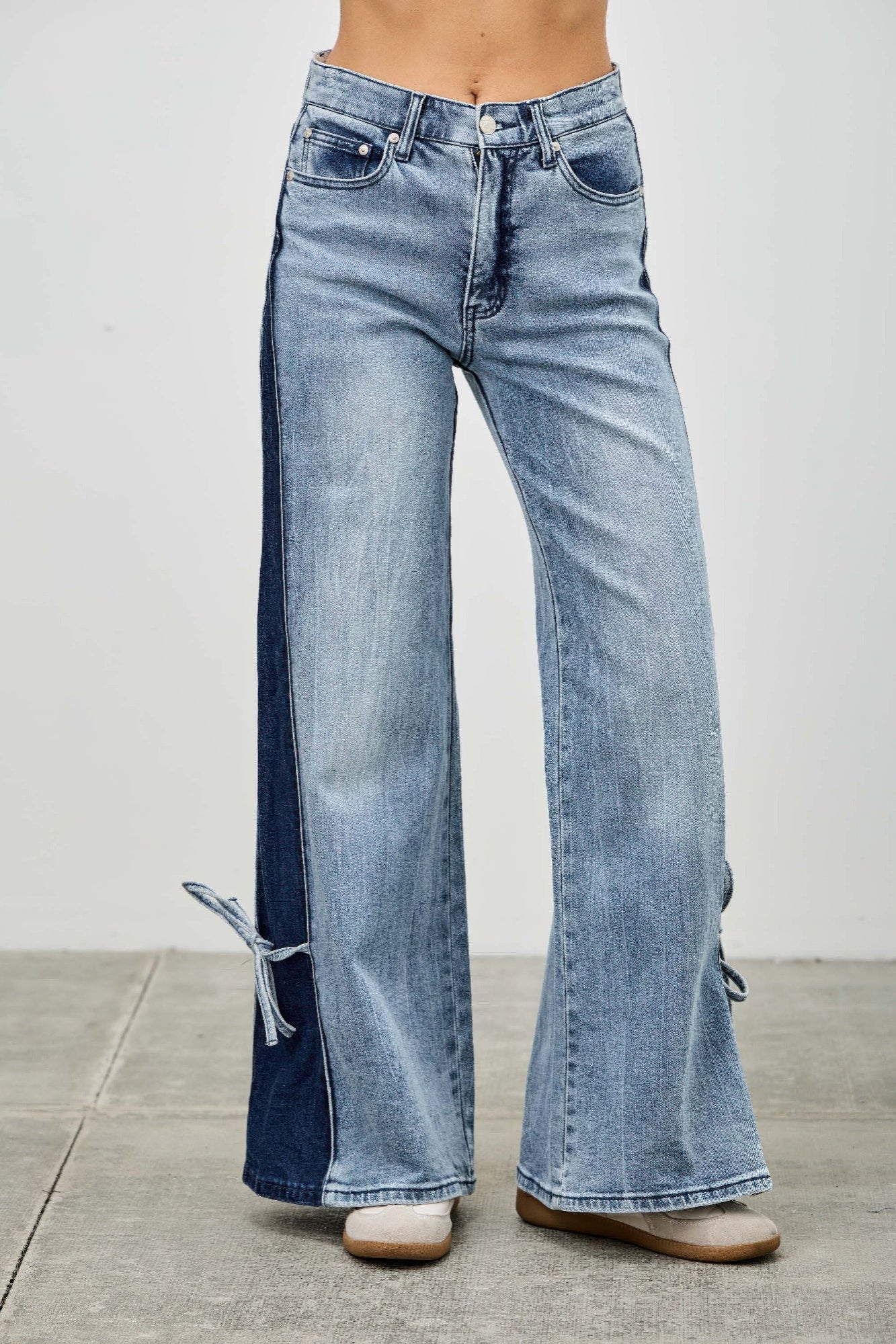 Mid-rise contrast wide-leg pants with side leg tie from Toshe Women's Fashions, showing the relaxed fit and stylish design.