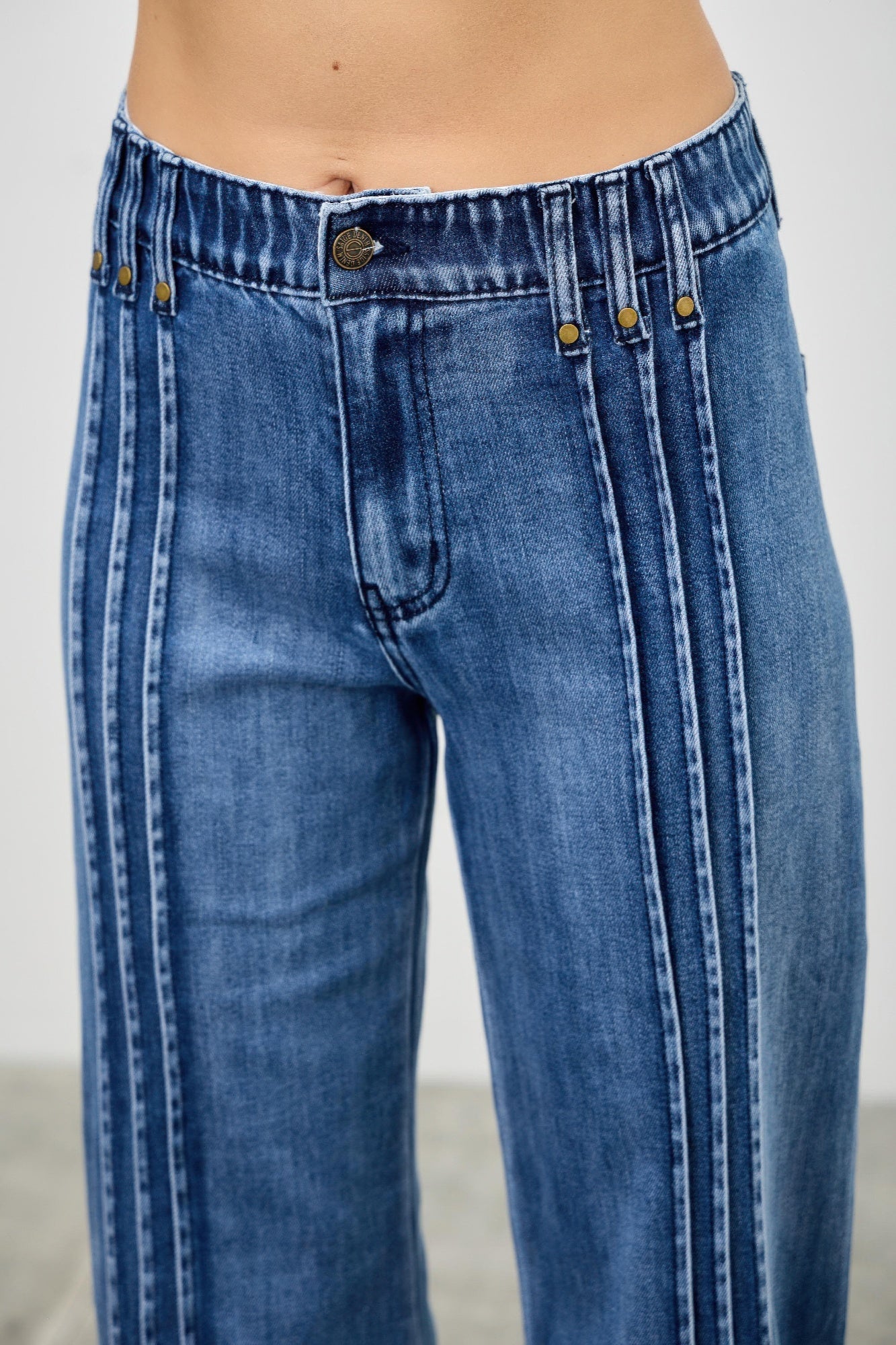 Toshe Women's Fashions high rise straight jeans with front line detailing, shown in a natural pose on a plain background.