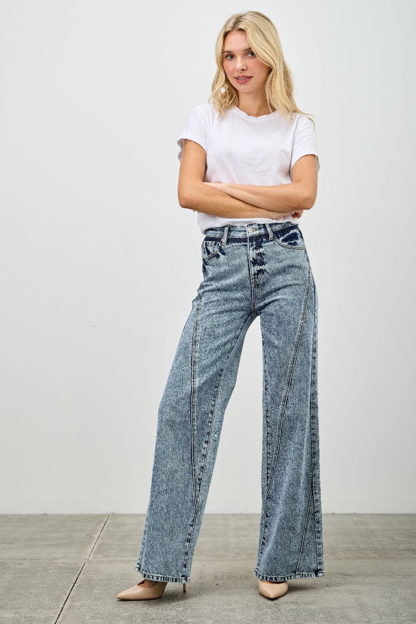 High rise relaxed straight jeans with seam detail from Toshe Women's Fashions, shown on a model.