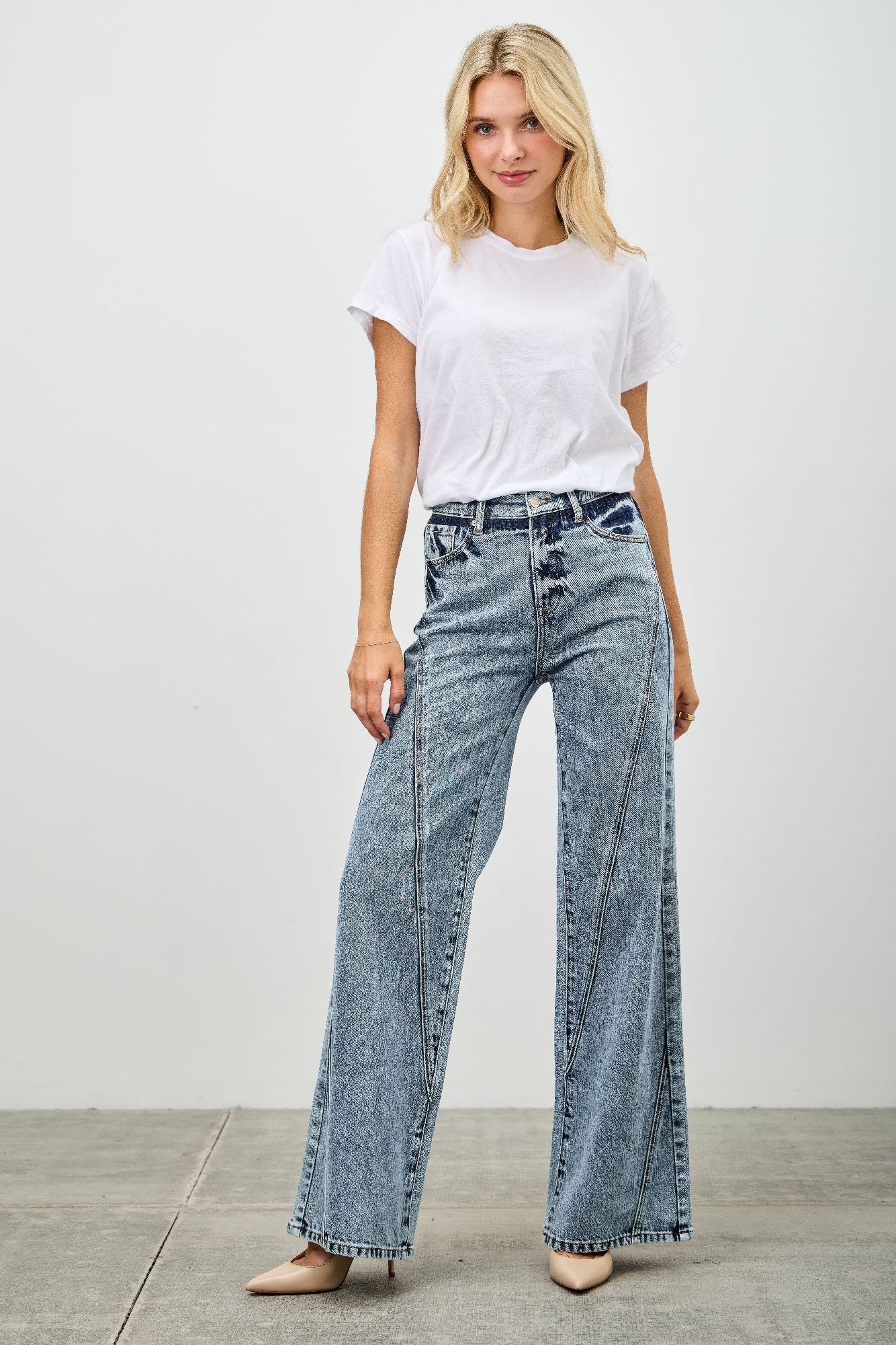 High rise relaxed straight jeans with seam detail by Toshe Women's Fashions, showing fit and stylish design.