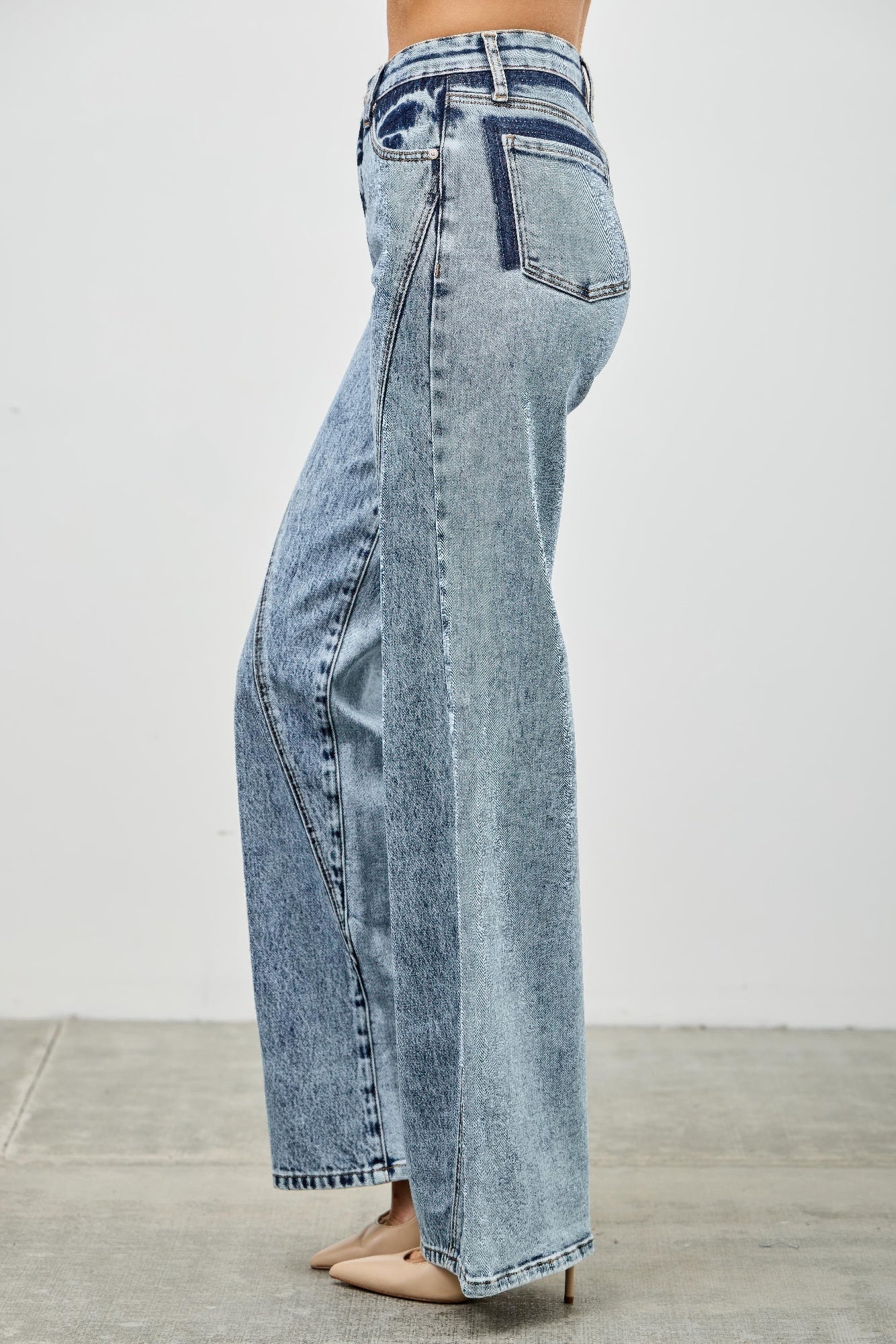 Toshe Women's Fashions high rise relaxed straight jeans with seam detail, denim fabric, and classic five-pocket design.