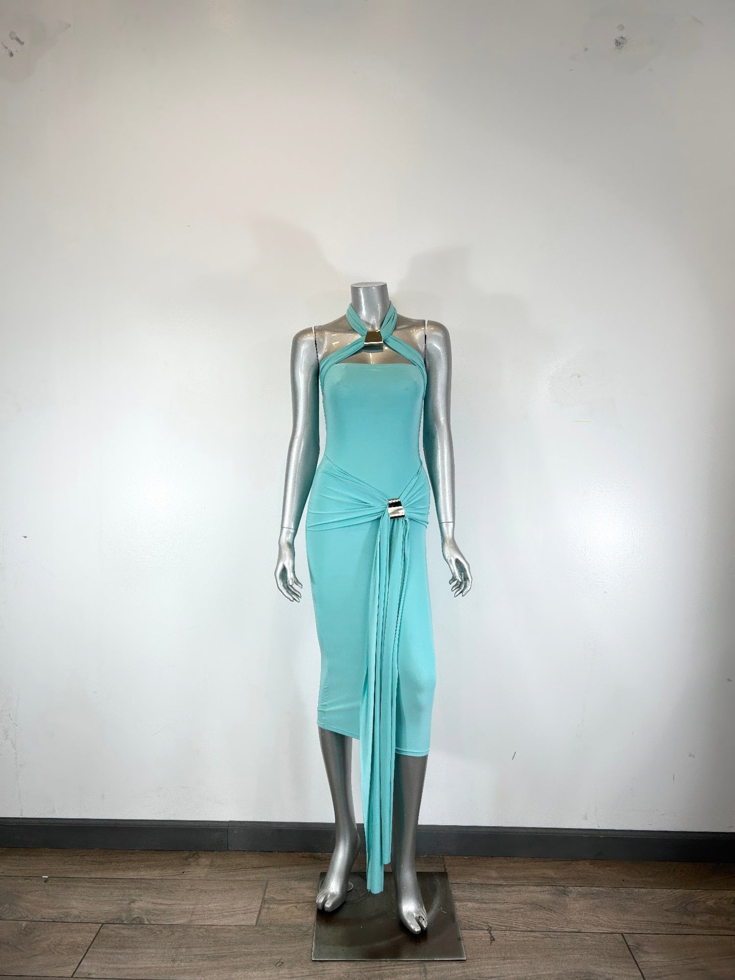 Halter-style bodycon midi dress from Toshe Women's Fashions, featuring a fitted silhouette and stylish design.