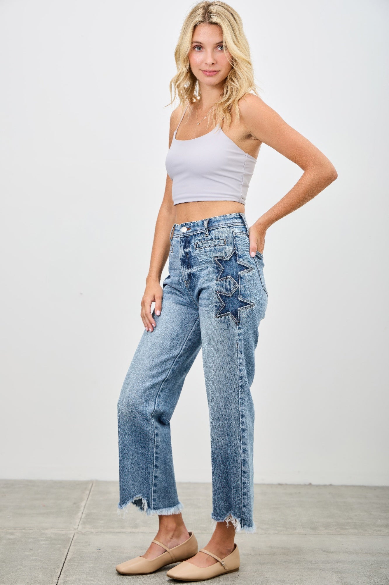 High-rise crop wide-leg jeans with star pattern from Toshe Women's Fashions, showing the stylish design and fit.