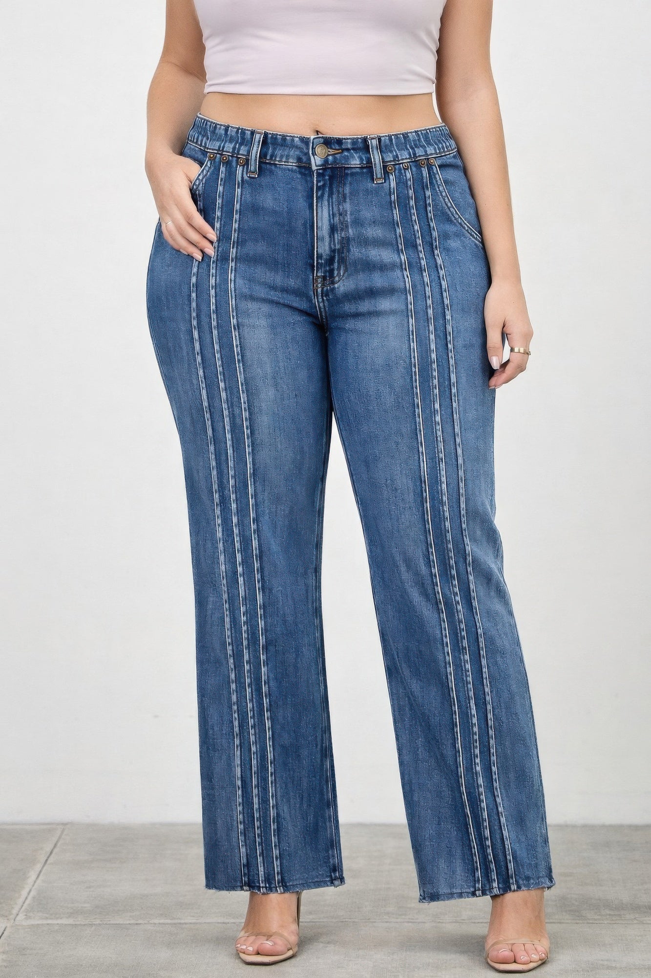 Toshe Women's Fashions high rise straight jeans with front lines, shown with a focus on the fit and stylish detail.