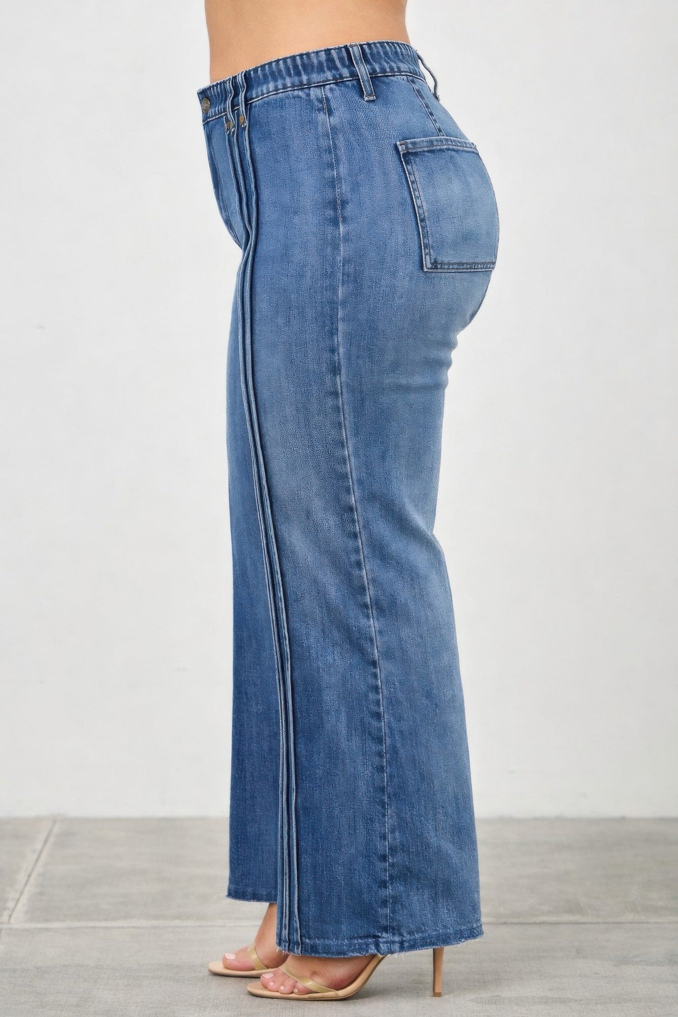 High rise straight jeans with front lines from Toshe Women's Fashions, showcasing the stylish fit and front seam details.
