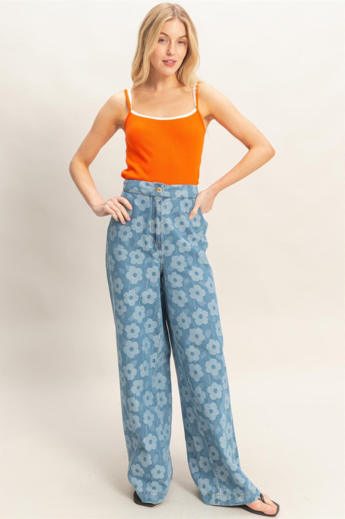 Floral wide-leg pants from Toshe Women's Fashions featuring a flowy design and vibrant floral pattern.