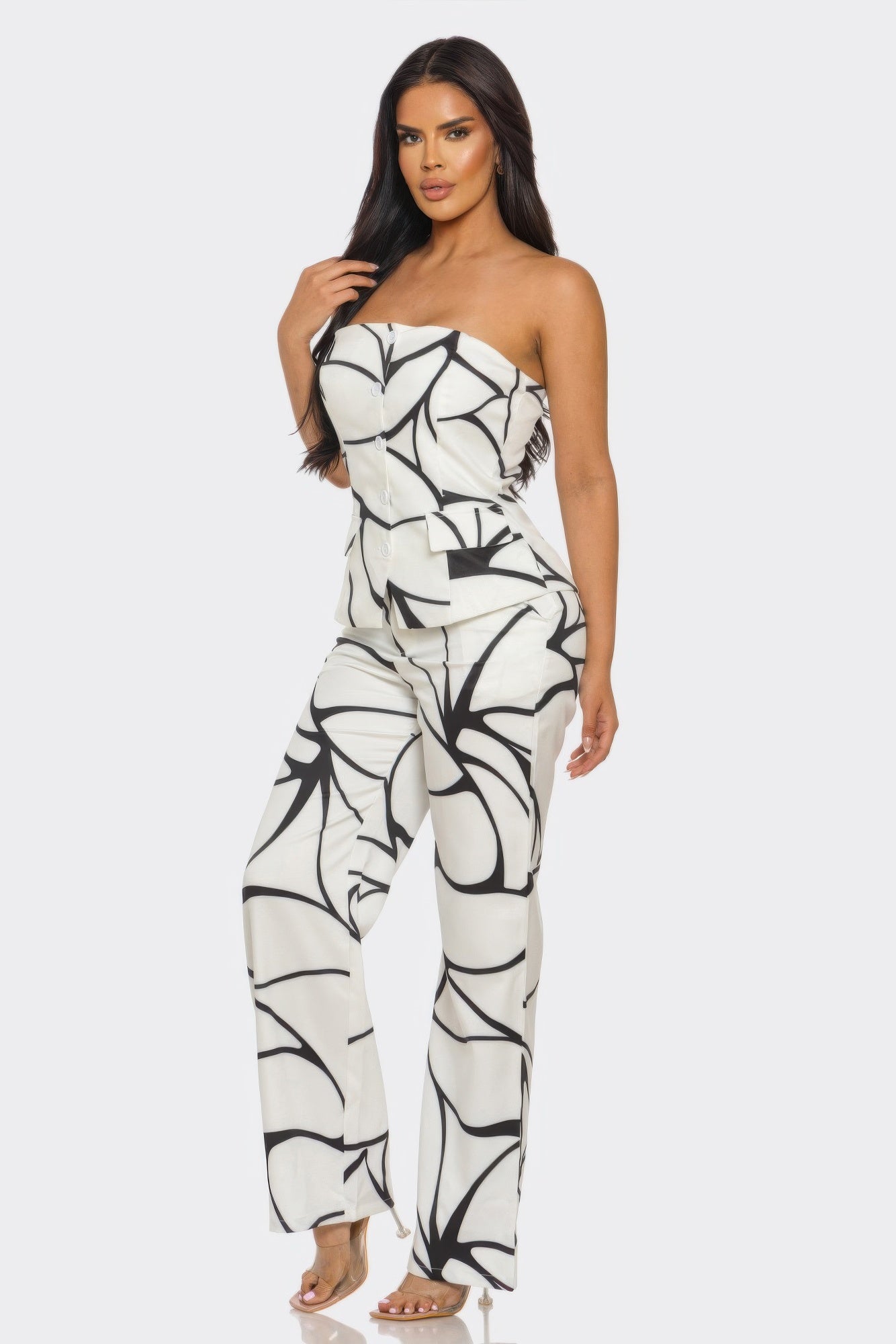 Abstract motion set from Toshe Women's Fashions featuring colorful, flowing fabric design in a stylish women's fashion ensemble.
