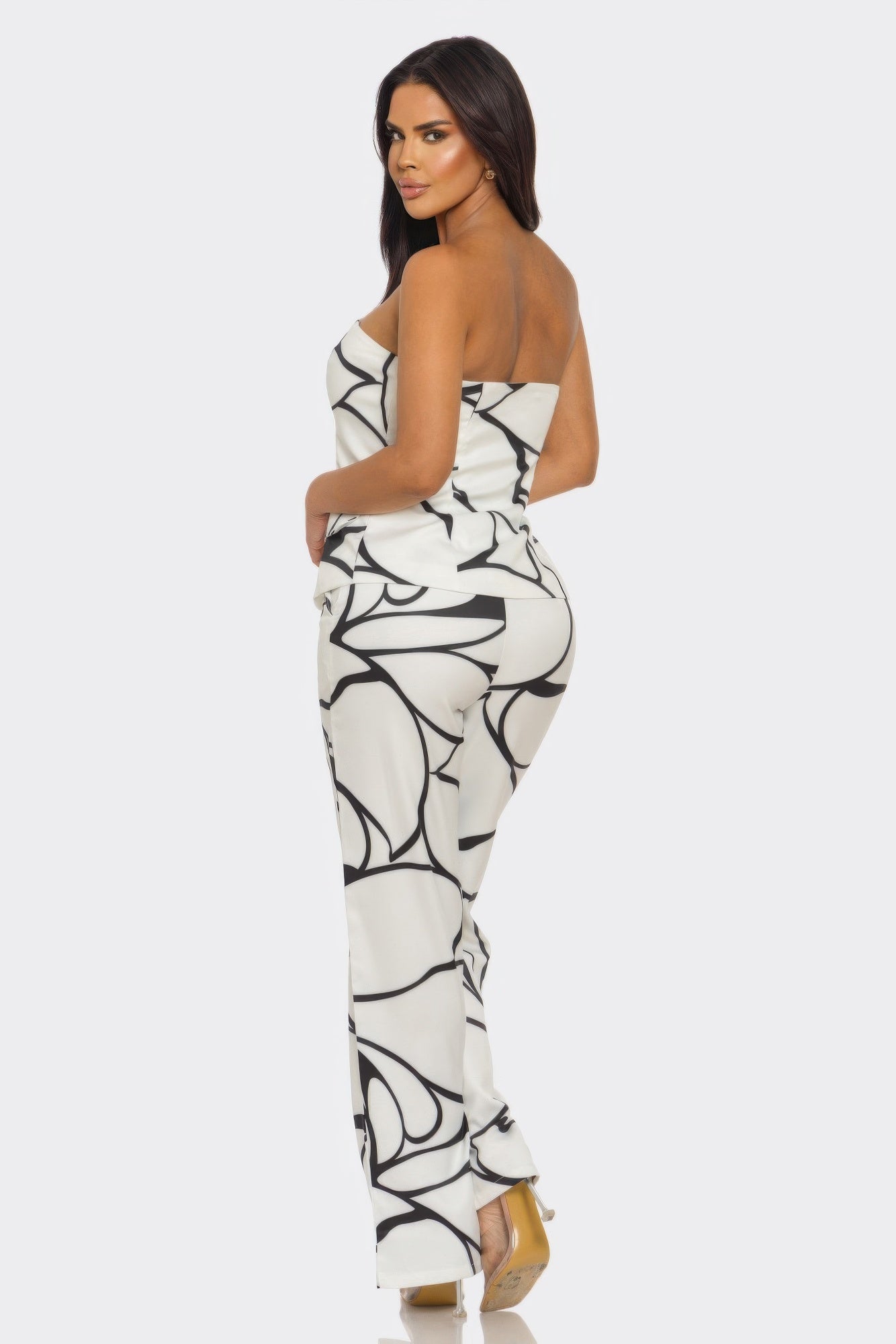 Abstract Motion Set by Toshe Women's Fashions featuring vibrant, flowing fabric with abstract patterns and dynamic movement.