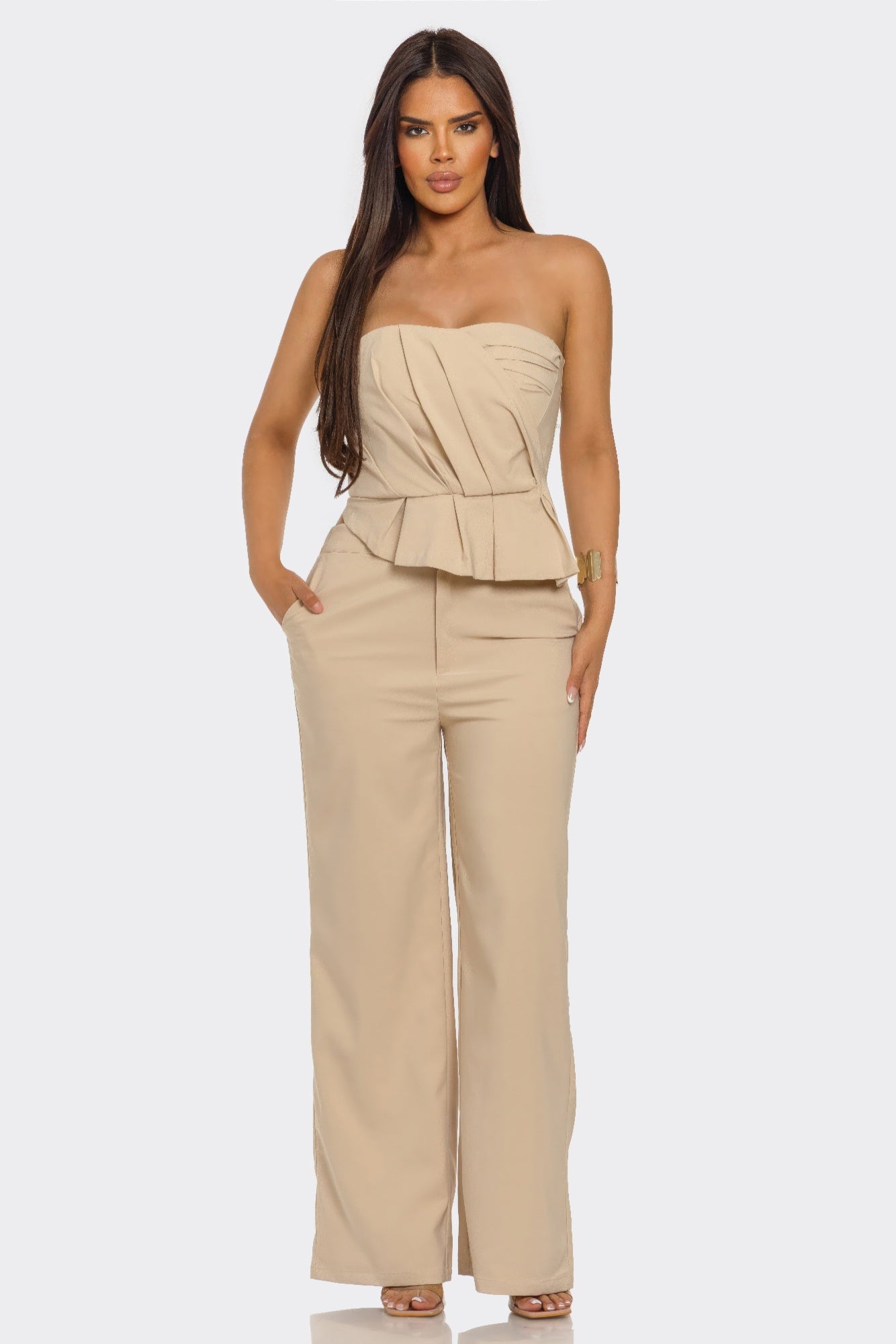 Sculpted Grace two-piece set by Toshe Women's Fashions featuring a fitted top and coordinating skirt in a sleek design.