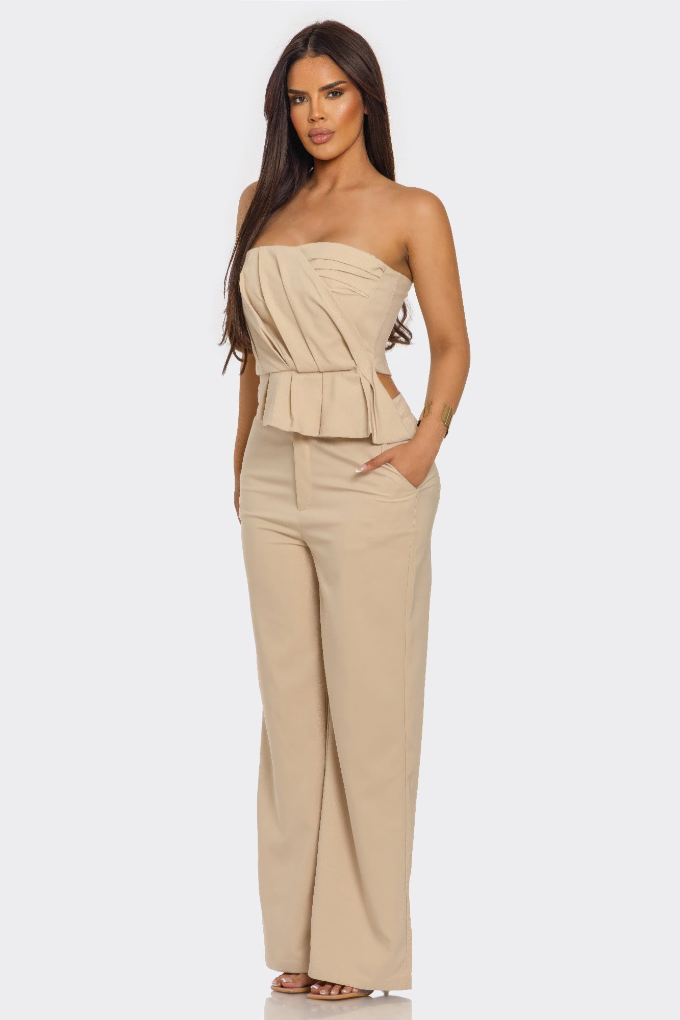 Sculpted Grace two-piece set by Toshe Women's Fashions featuring a fitted top and matching skirt in soft pastel fabric.