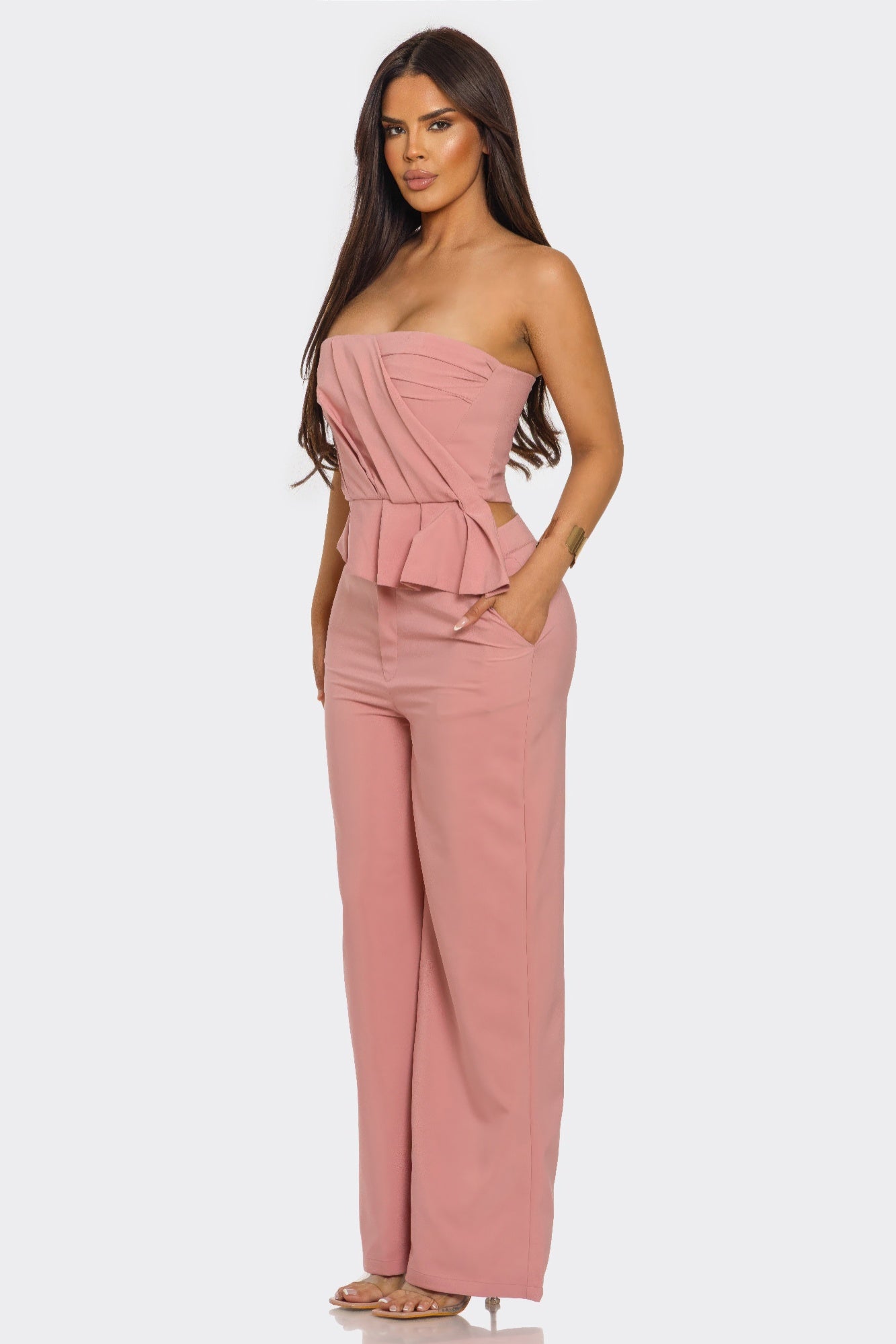 Sculpted Grace two-piece set by Toshe Women's Fashions, featuring a fitted top and matching skirt in a sleek, modern design.
