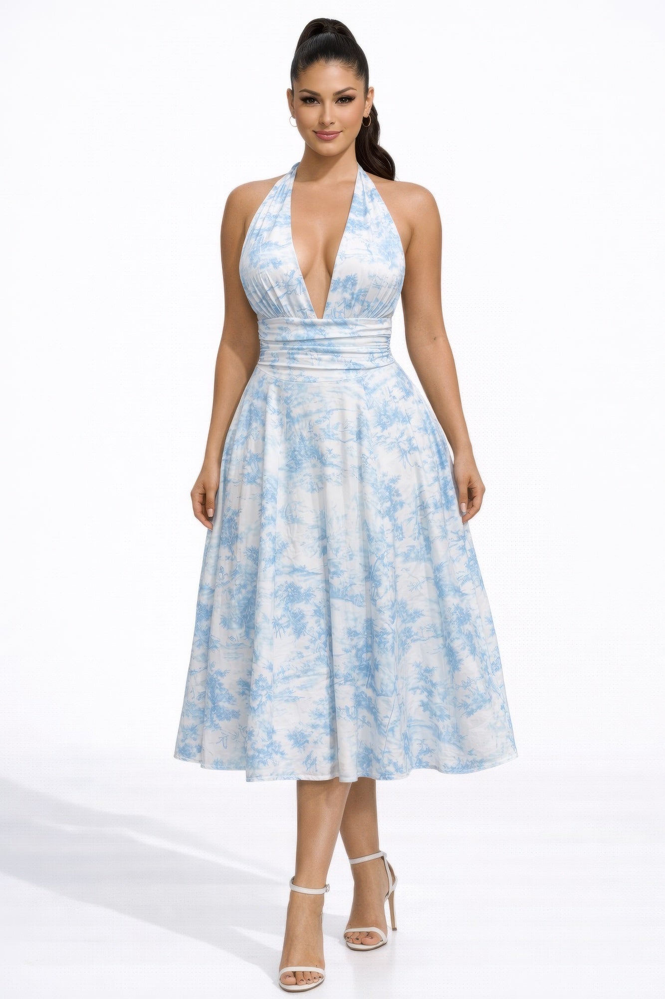 Seraphina Garden Muse Dress by Toshe Women's Fashions, featuring a floral pattern and flowing fabric, displayed on a mannequin.