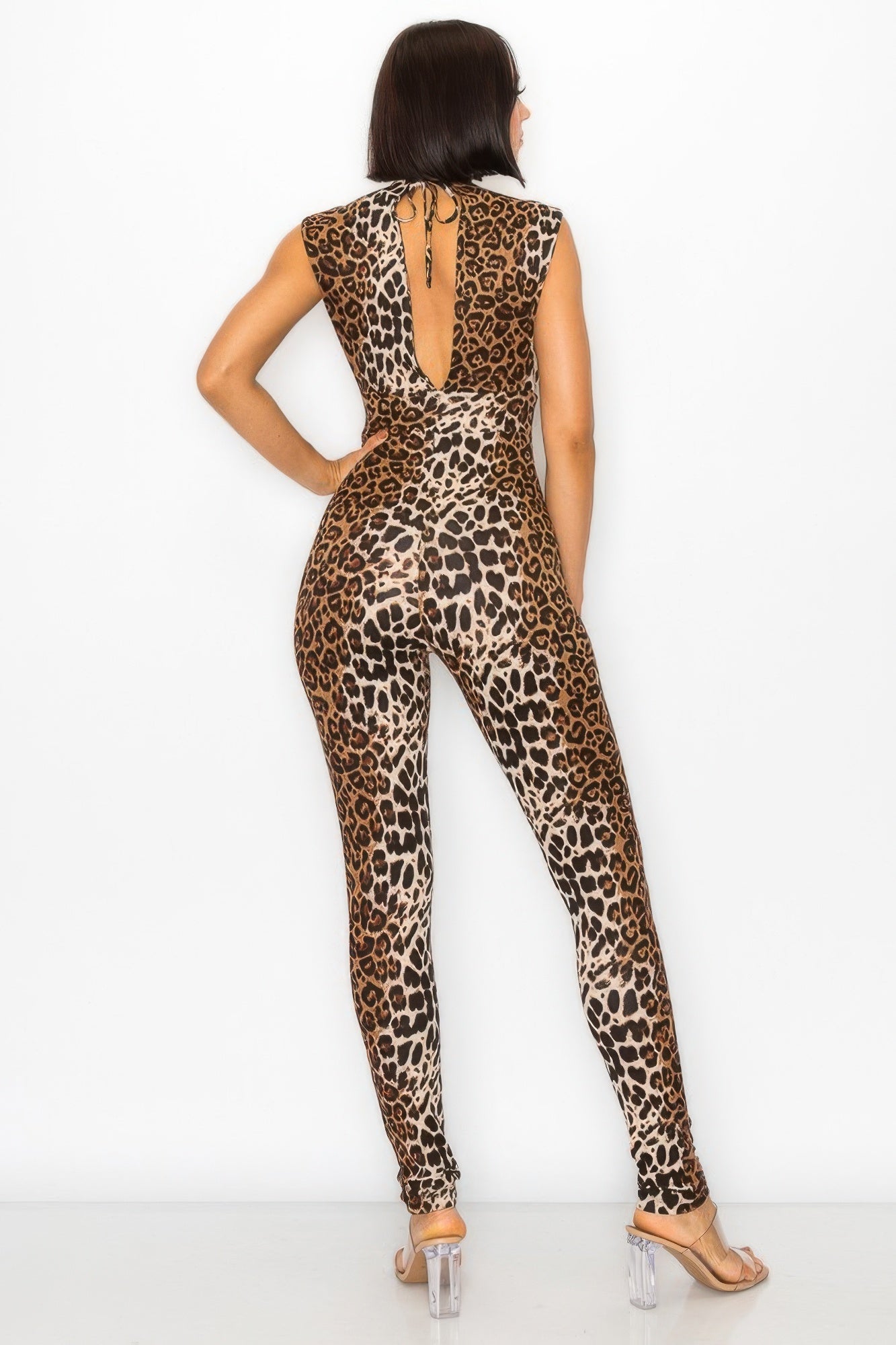 Leopard open side detail jumpsuit from Toshe Women's Fashions featuring a stylish, fitted design and side slit accents.