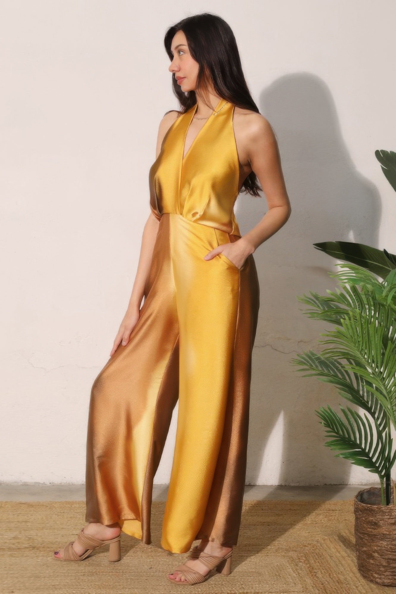 Ombre SatinLook convertible halter jumpsuit by Toshe Women's Fashions, featuring flowing fabric and adjustable halter neckline.