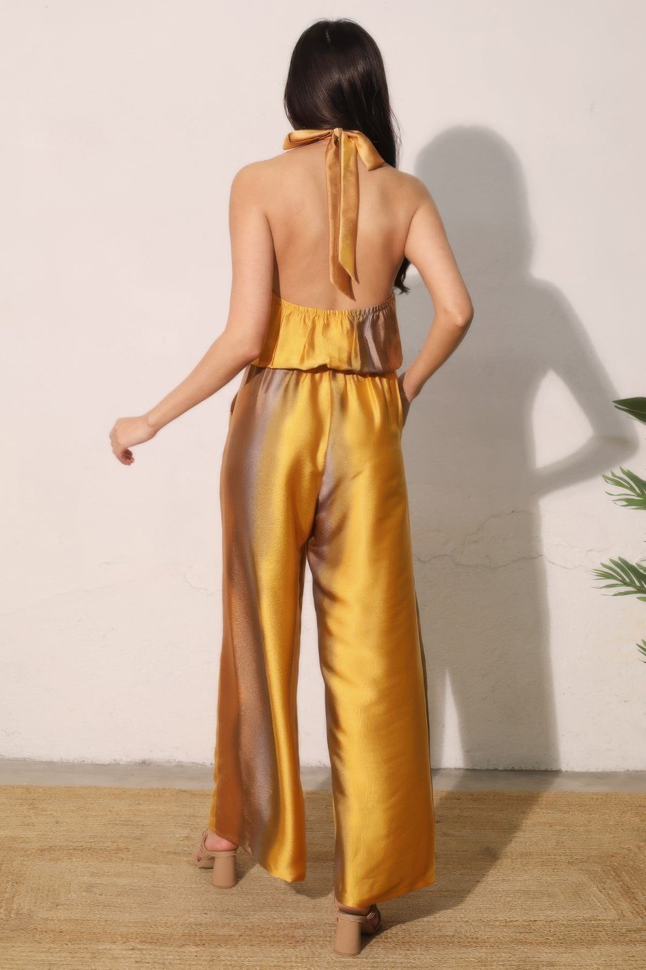 Ombre SatinLook convertible halter jumpsuit from Toshe Women's Fashions, featuring a stylish satin finish and adjustable halter neckline.
