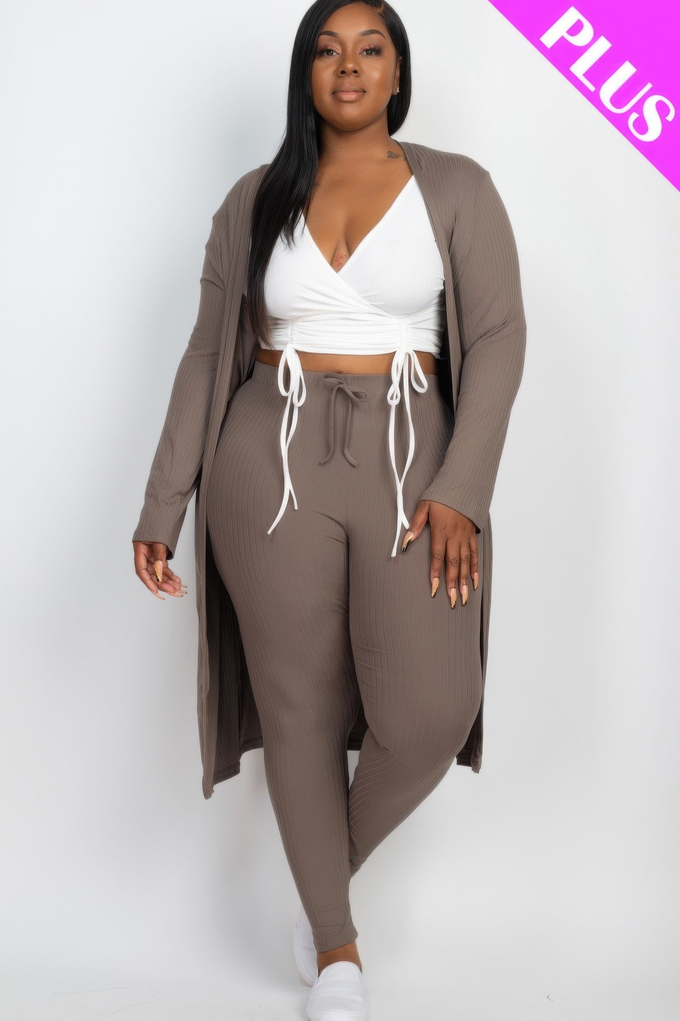Ribbed long cardigan and matching leggings set by Toshe Women's Fashions, featuring a cozy, fitted knit design in neutral tones.