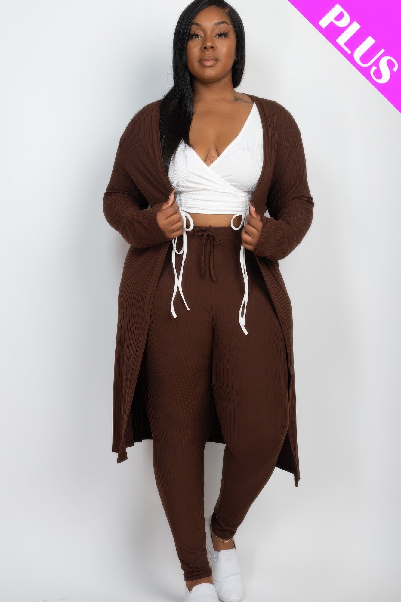 Ribbed long cardigan and leggings set by Toshe Women's Fashions, shown in a cozy, fitted style with ribbed texture and neutral color.