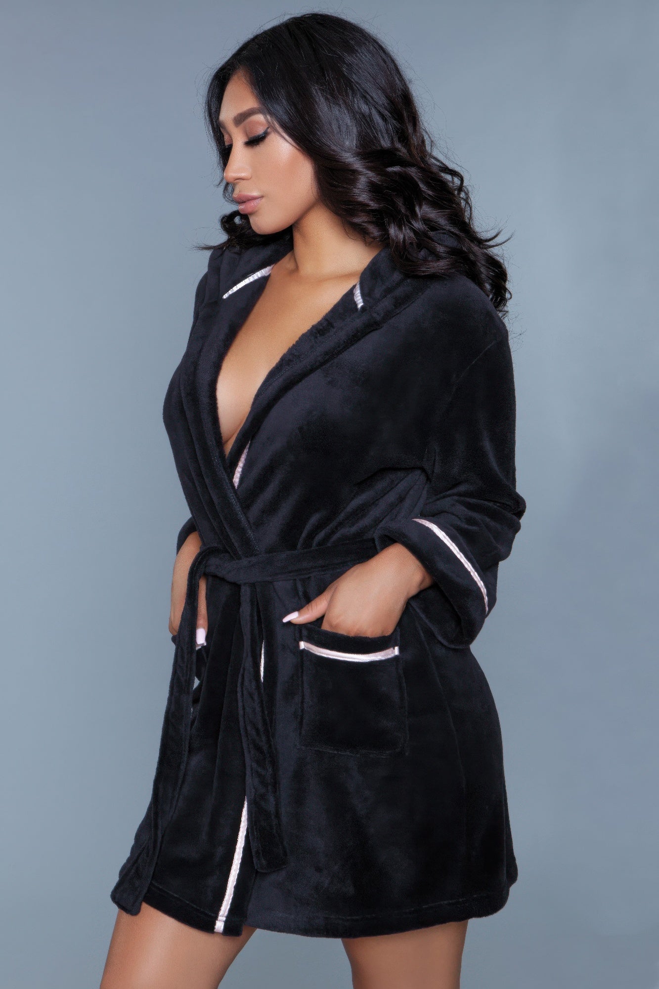 Toshe Women's Fashions Alyssa Robe in soft fabric, featuring a relaxed fit and elegant design, shown hanging on a wooden hanger.