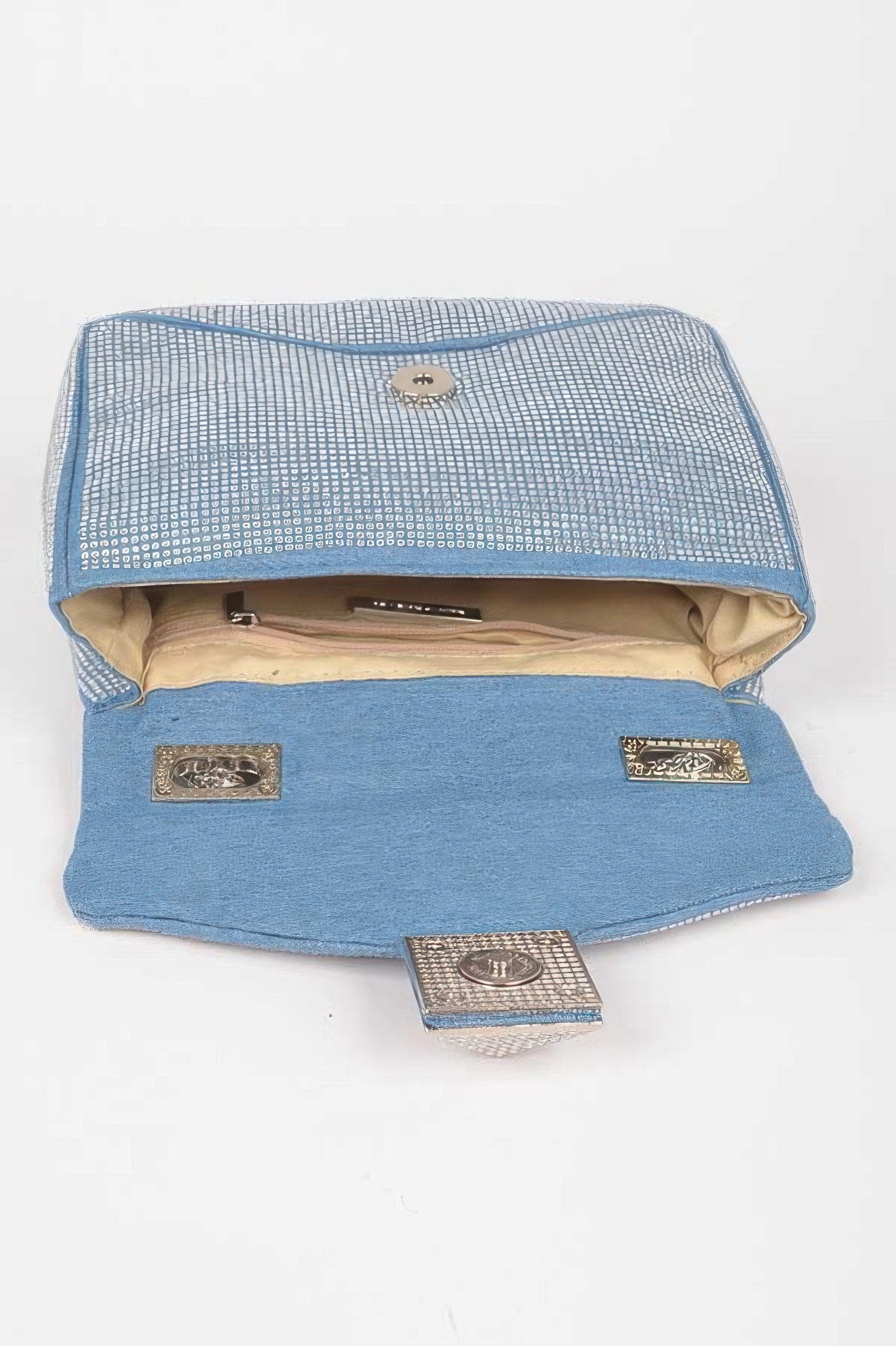 Rhinestone denim clutch bag by Toshe Women's Fashions with sparkling embellishments and a compact design.