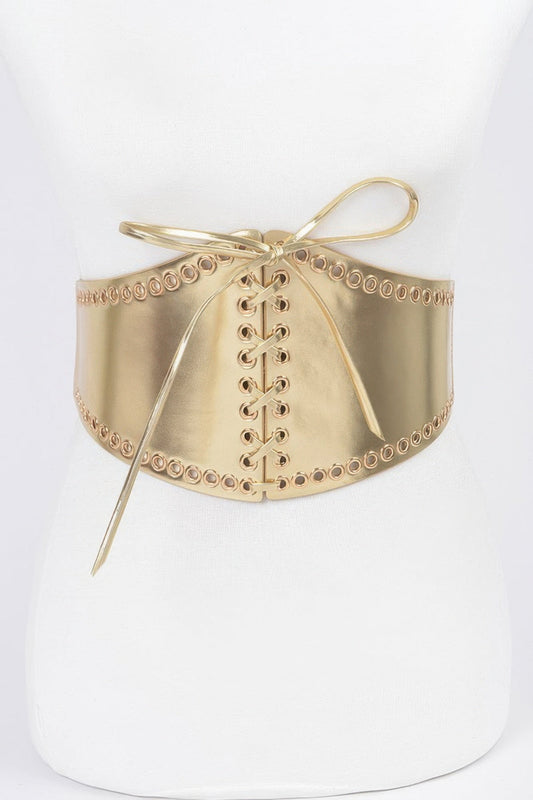 Faux leather eyelet corset elastic belt with metal eyelets and adjustable fit, designed by Toshe Women's Fashions.