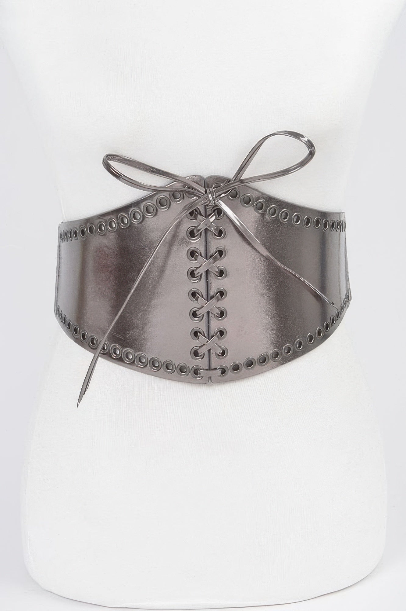 Faux leather eyelet corset elastic belt in black with silver eyelets, styled for women's fashion.