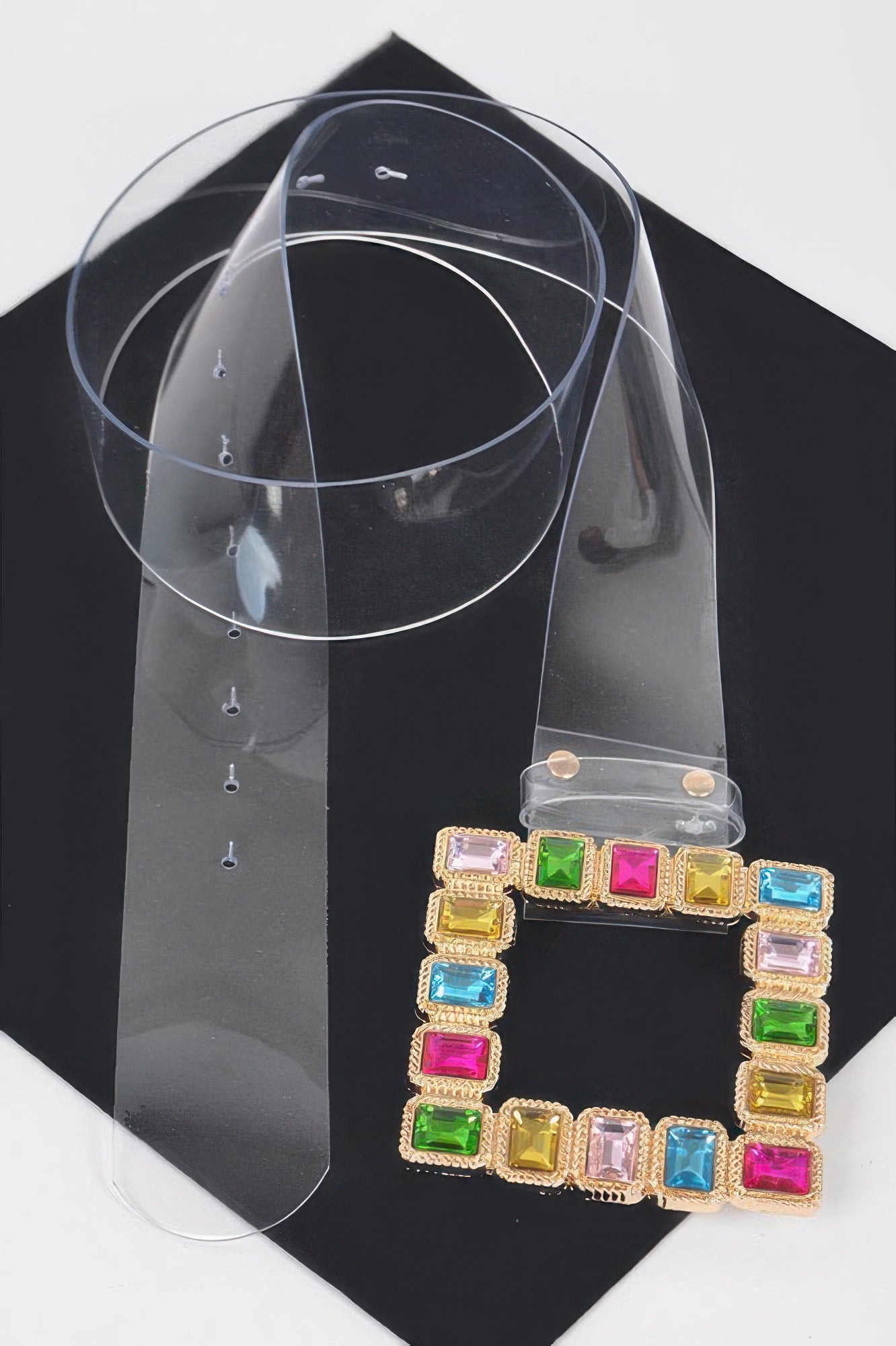 Transparent belt with a stone buckle from Toshe Women's Fashions, featuring clear PVC material and decorative stone accents.