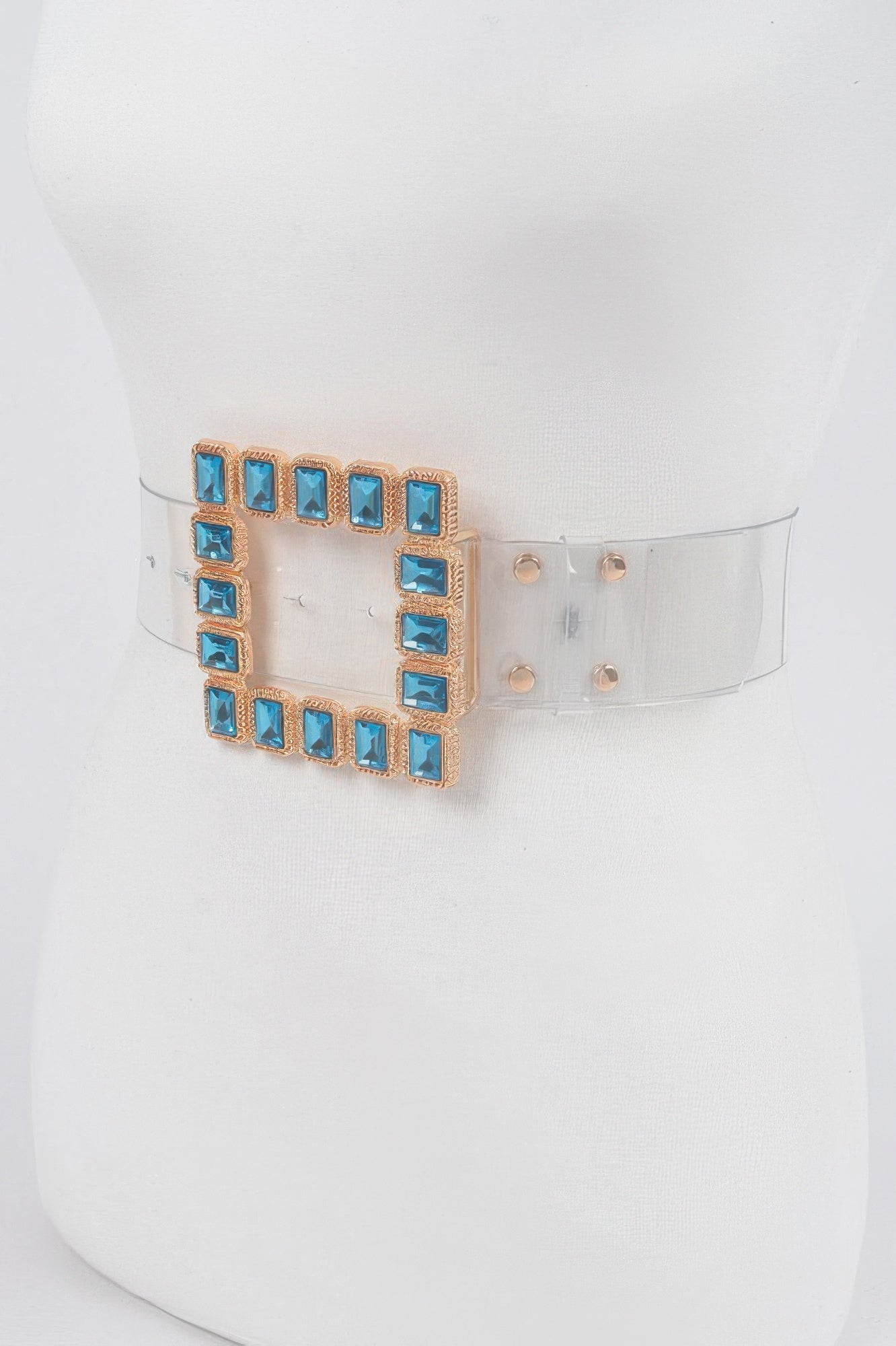Faux leather belt with stone buckle from Toshe Women's Fashions, showcasing a stylish accessory with a decorative stone buckle.