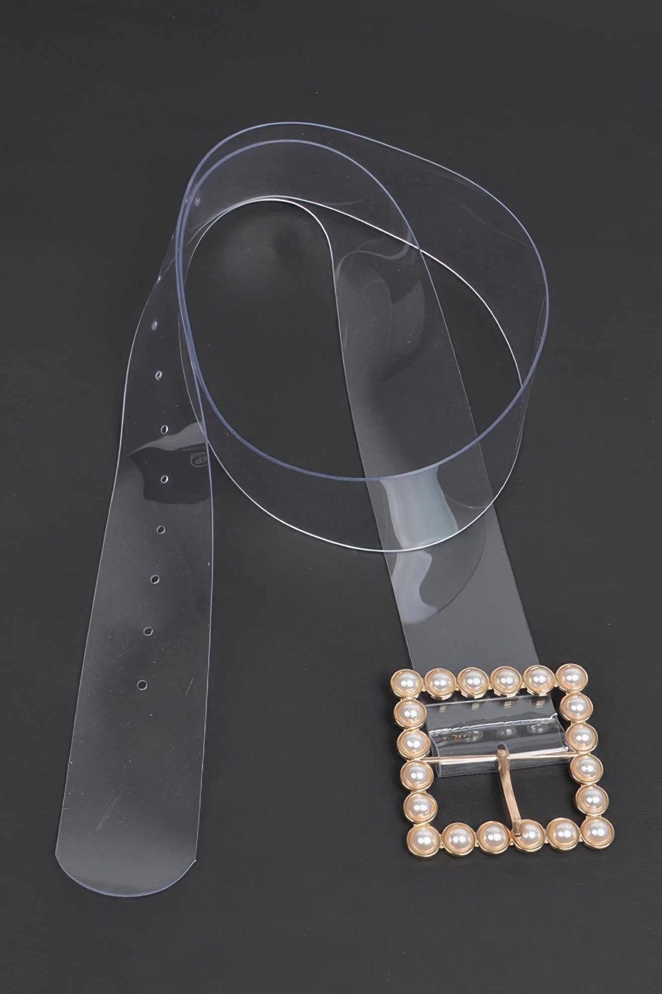Beaded square belt from Toshe Women's Fashions featuring intricate beadwork and a stylish square buckle.
