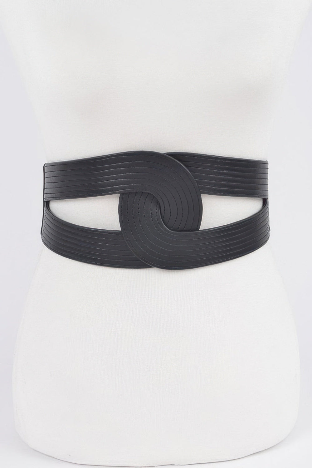Faux leather elastic belt from Toshe Women's Fashions, featuring a sleek design with a metal buckle and adjustable fit.