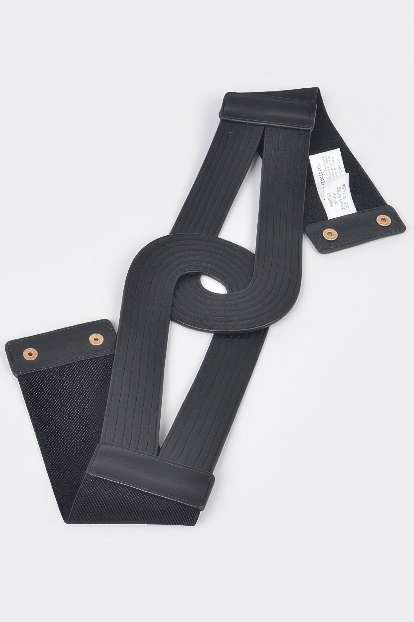 Faux leather elastic belt with adjustable strap and metal buckle, designed for women by Toshe Women's Fashions.