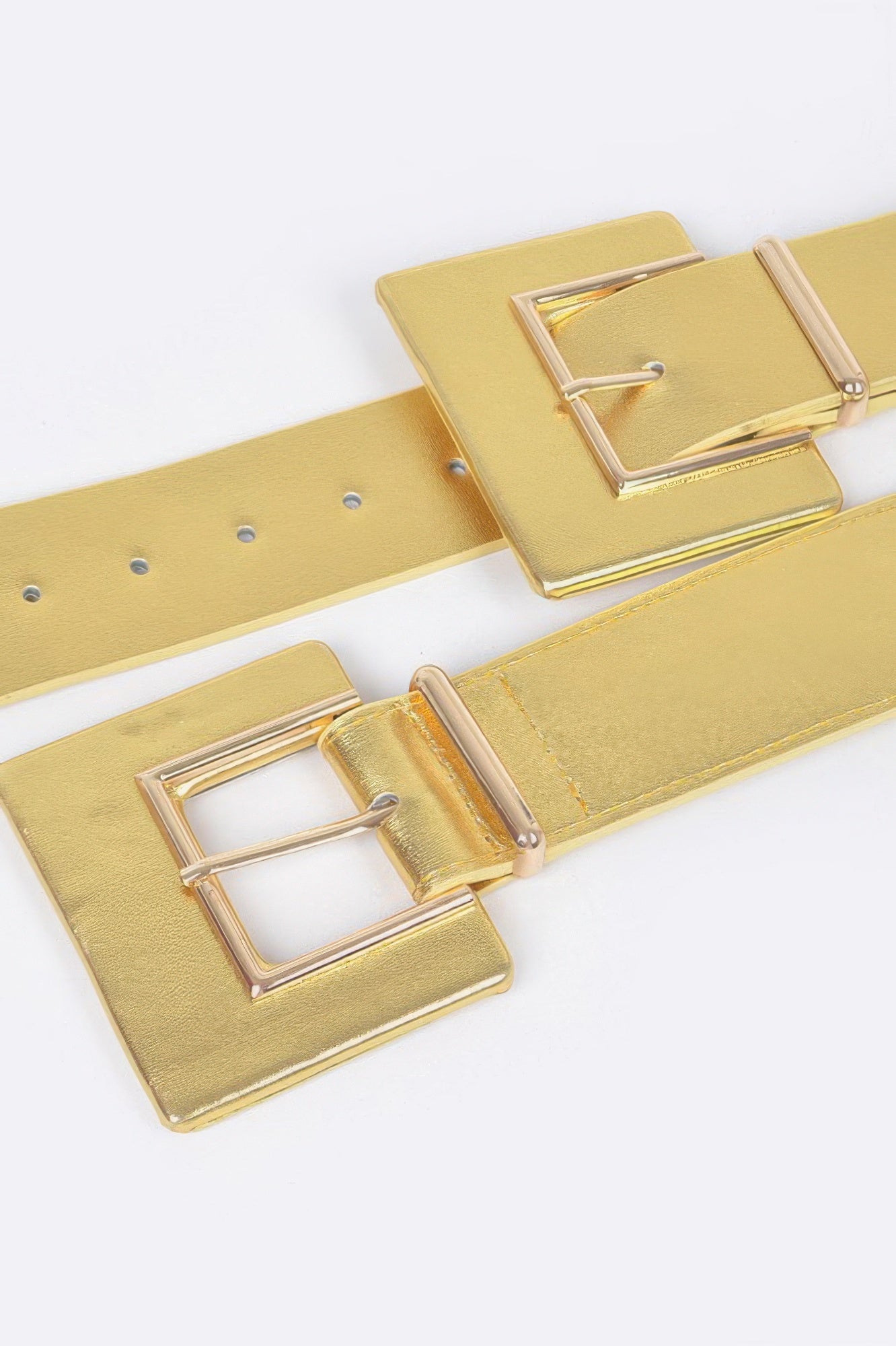 Elastic belt with two buckles from Toshe Women's Fashions, featuring a stylish design and adjustable fit.