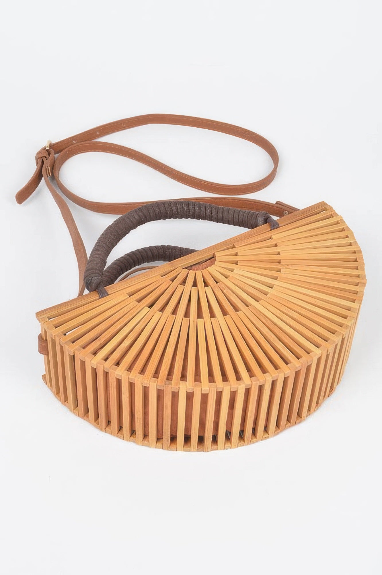 Handmade bamboo clutch bag with woven design from Toshe Women's Fashions, stylish accessory for casual and evening wear.