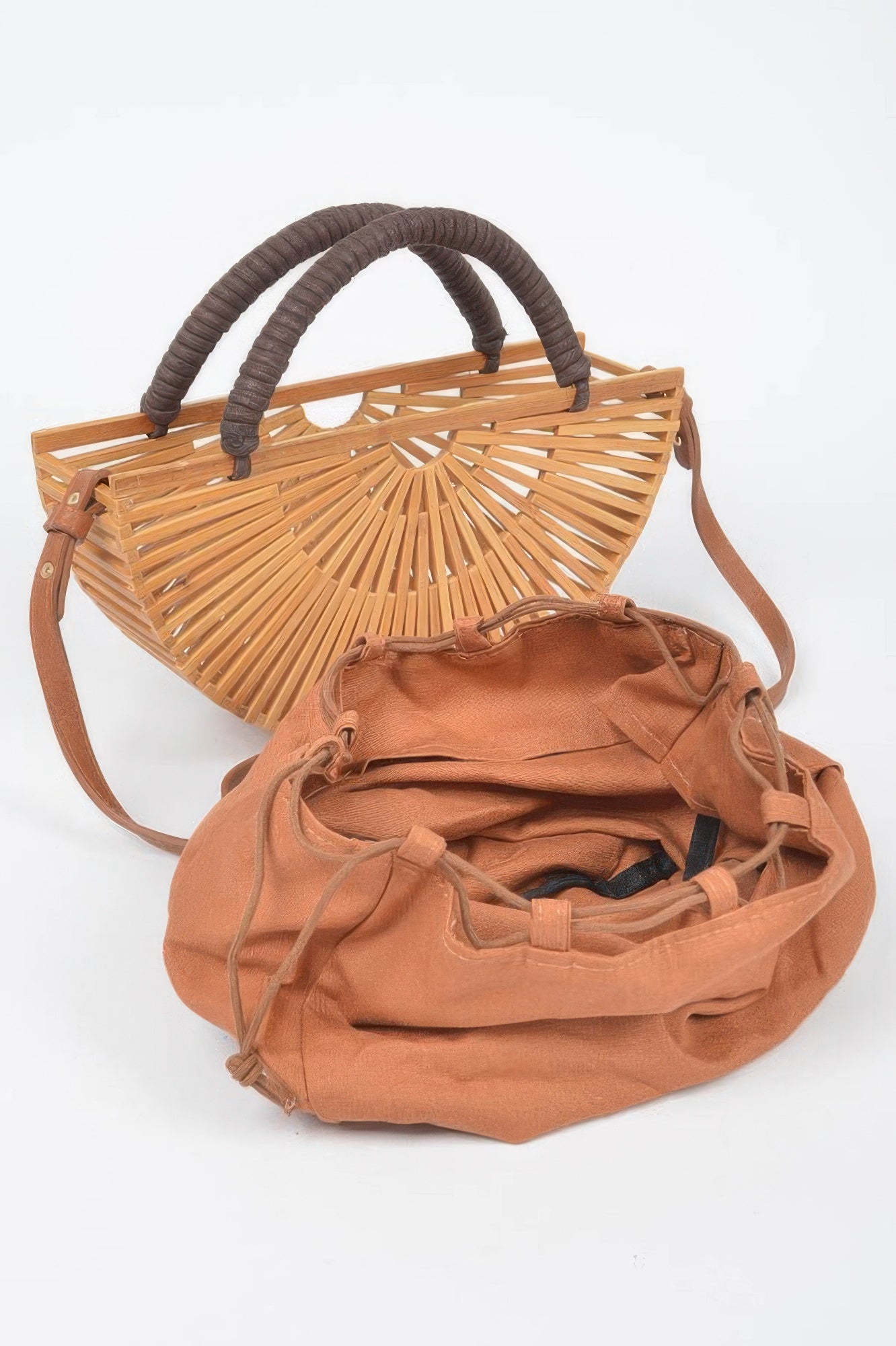 Handmade bamboo clutch bag with woven texture, stylish accessory from Toshe Women's Fashions, perfect for casual or evening wear.