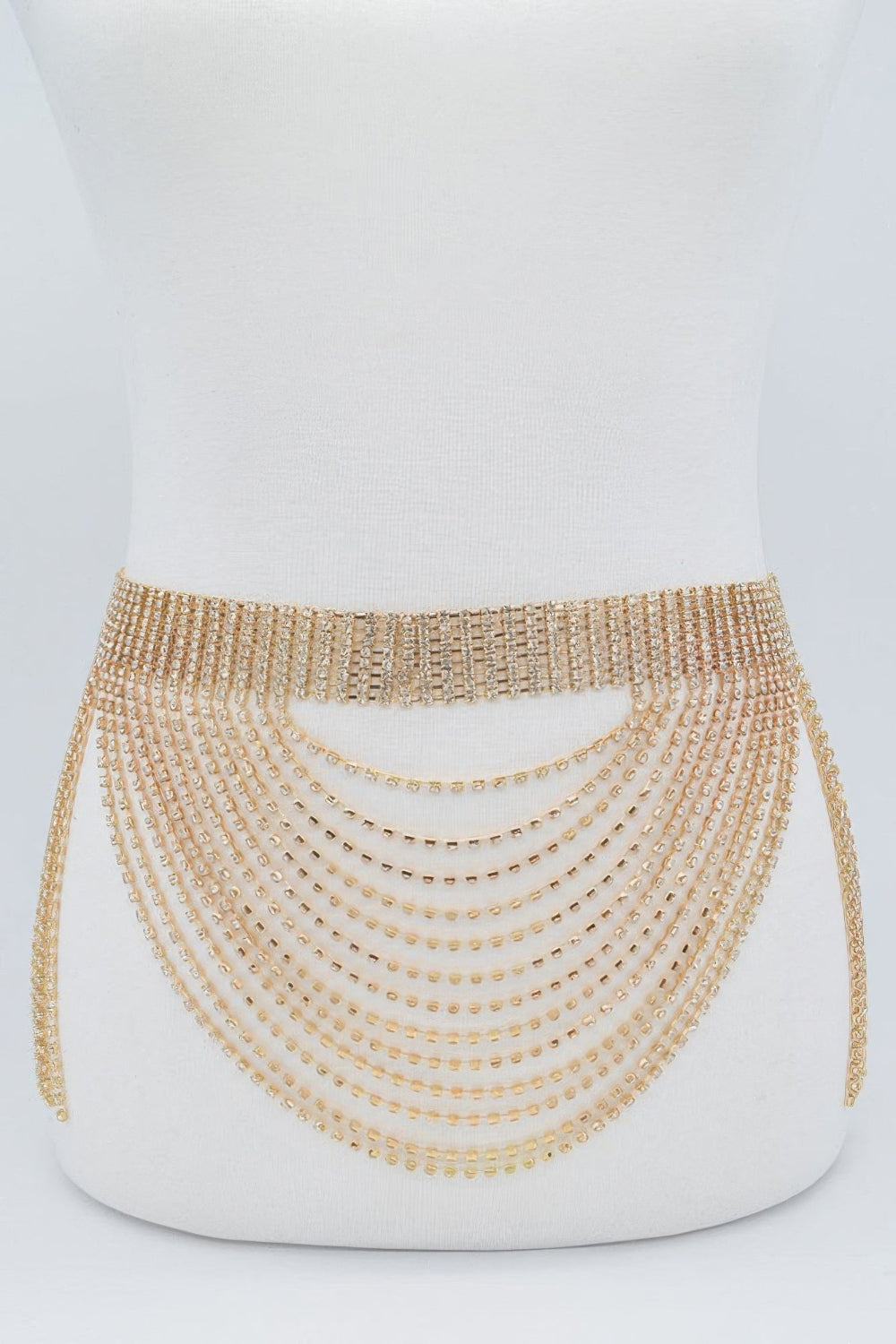 Rhinestone multi-layered drop belt with sparkling embellishments, stylish accessory from Toshe Women's Fashions.
