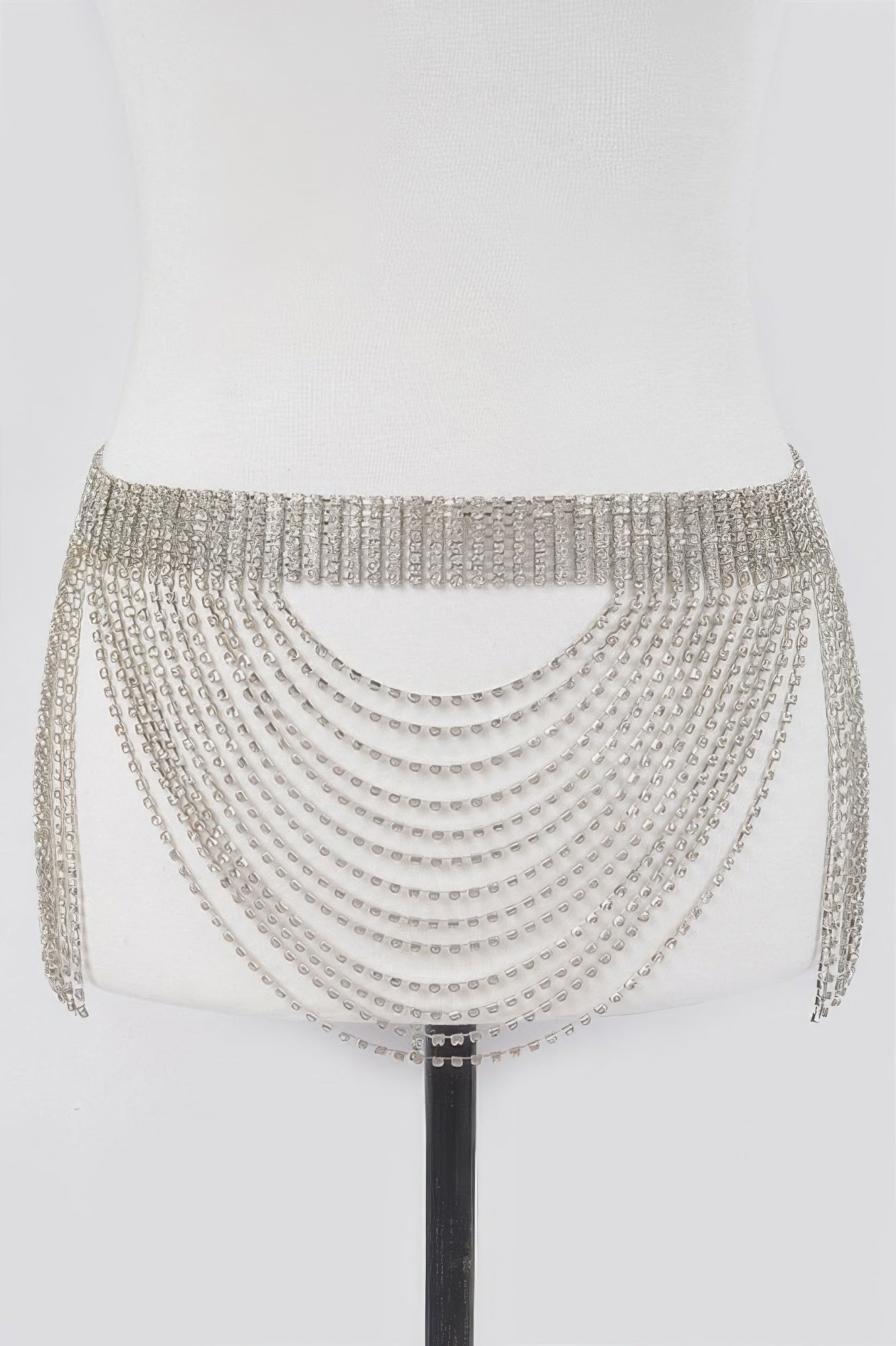 Rhinestone multi-layered drop belt with sparkling embellishments, designed for women’s fashion by Toshe Women's Fashions.