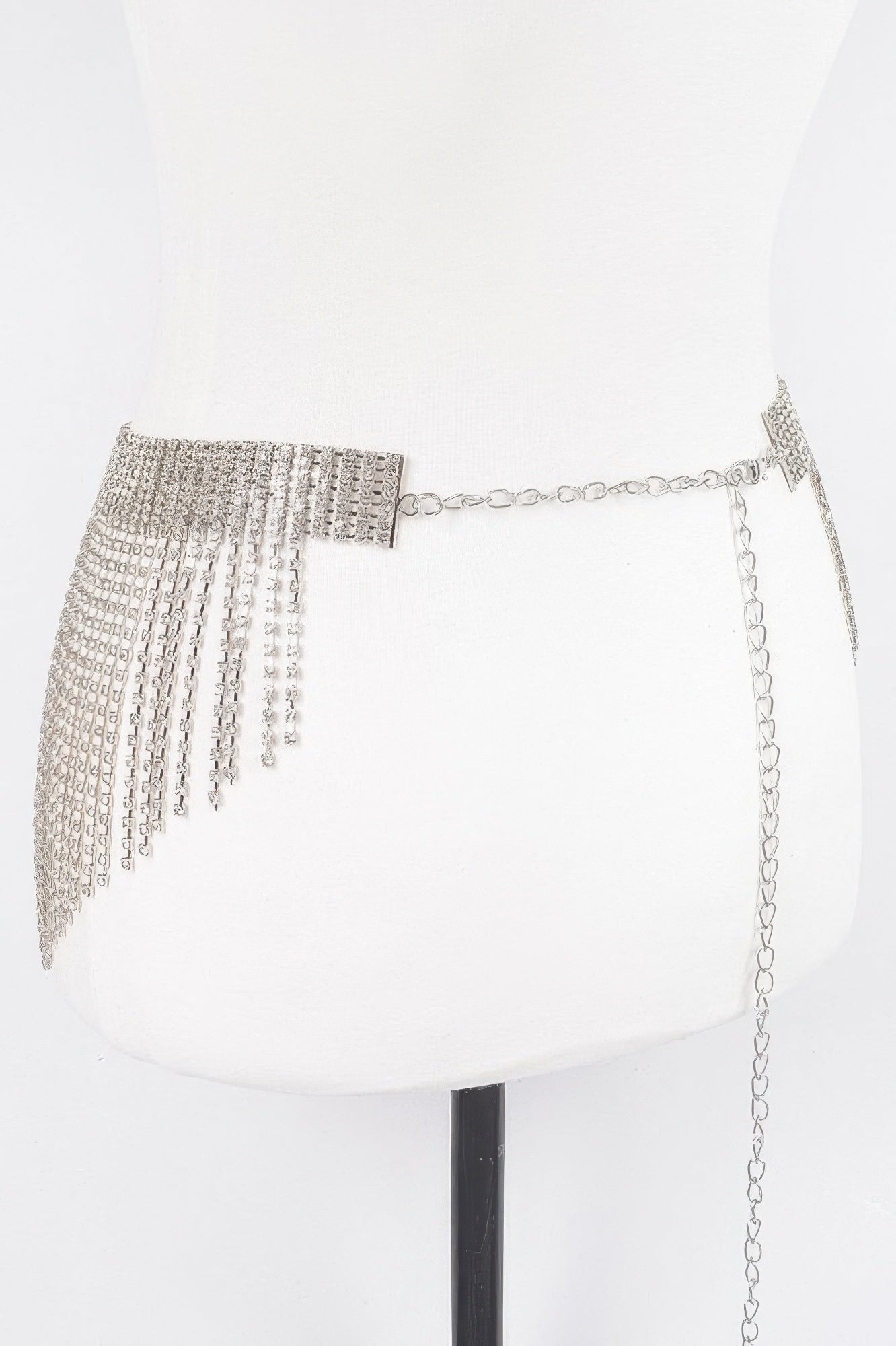 Rhinestone multi-layered drop belt with sparkling embellishments, stylish accessory from Toshe Women's Fashions.