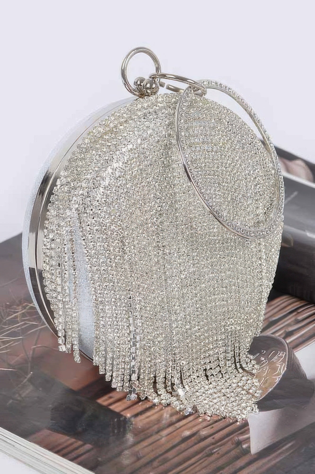 Rhinestone fringe round party bag with sparkling embellishments, stylish accessory by Toshe Women's Fashions.