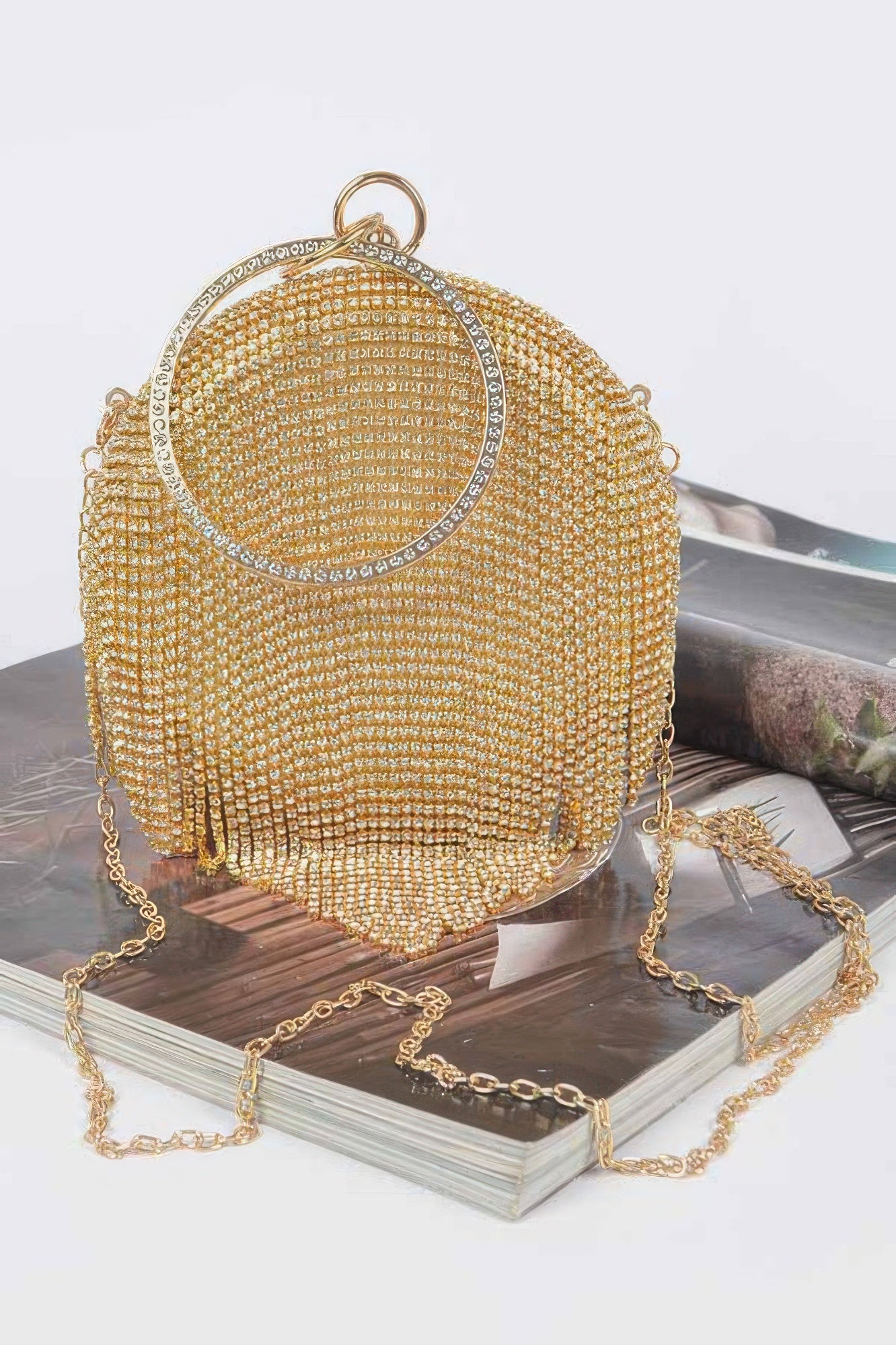 Rhinestone fringe round party bag with sparkling embellishments, stylish accessory from Toshe Women's Fashions.