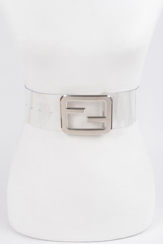 Clear belt with a metal buckle from Toshe Women's Fashions, showing the sleek, transparent strap and shiny silver buckle.