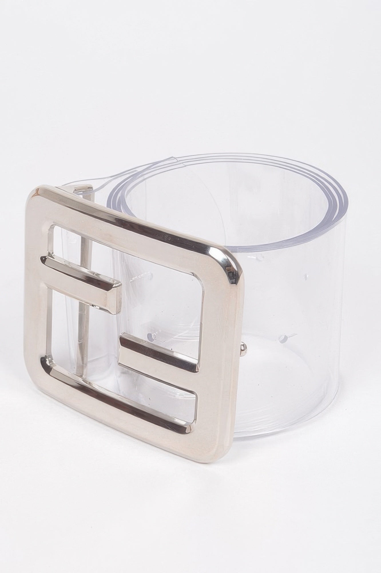 Metal buckle clear belt from Toshe Women's Fashions, featuring a transparent strap and sleek metallic buckle.